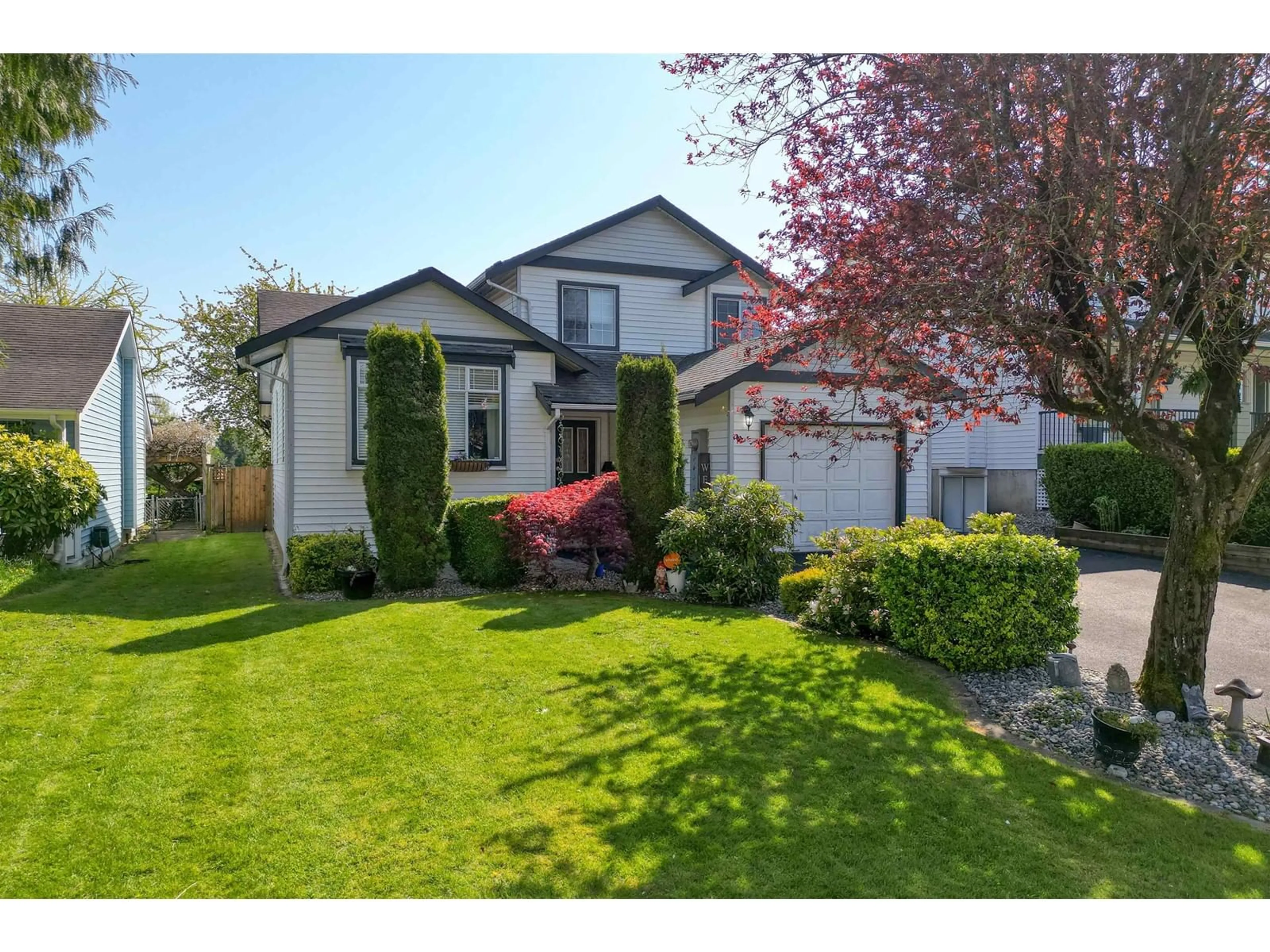 Home with vinyl exterior material, street for 27320 26B, Langley British Columbia V4W3K2