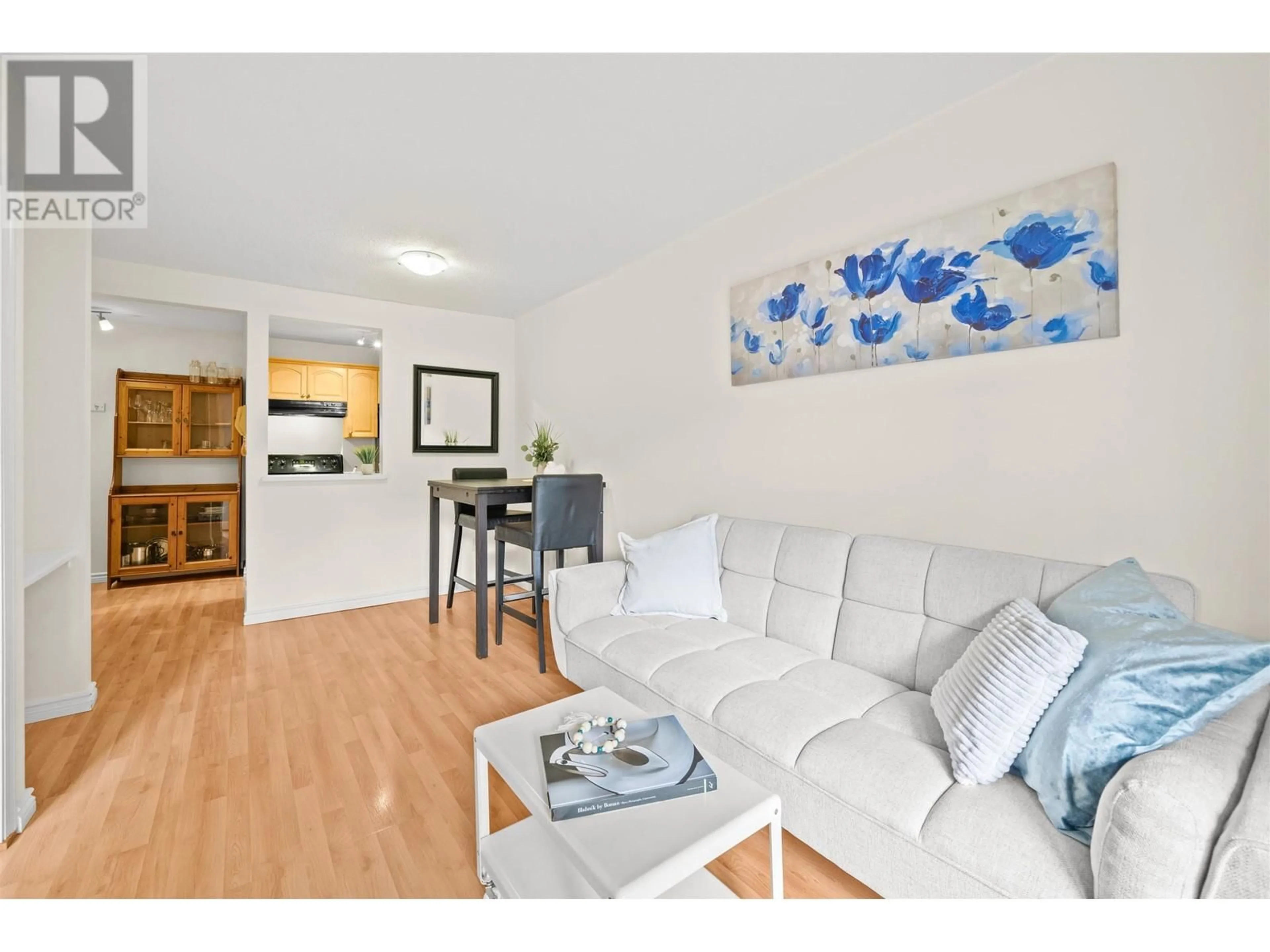 Living room with furniture, wood/laminate floor for 208 - 2330 MAPLE STREET, Vancouver British Columbia V6J3T6