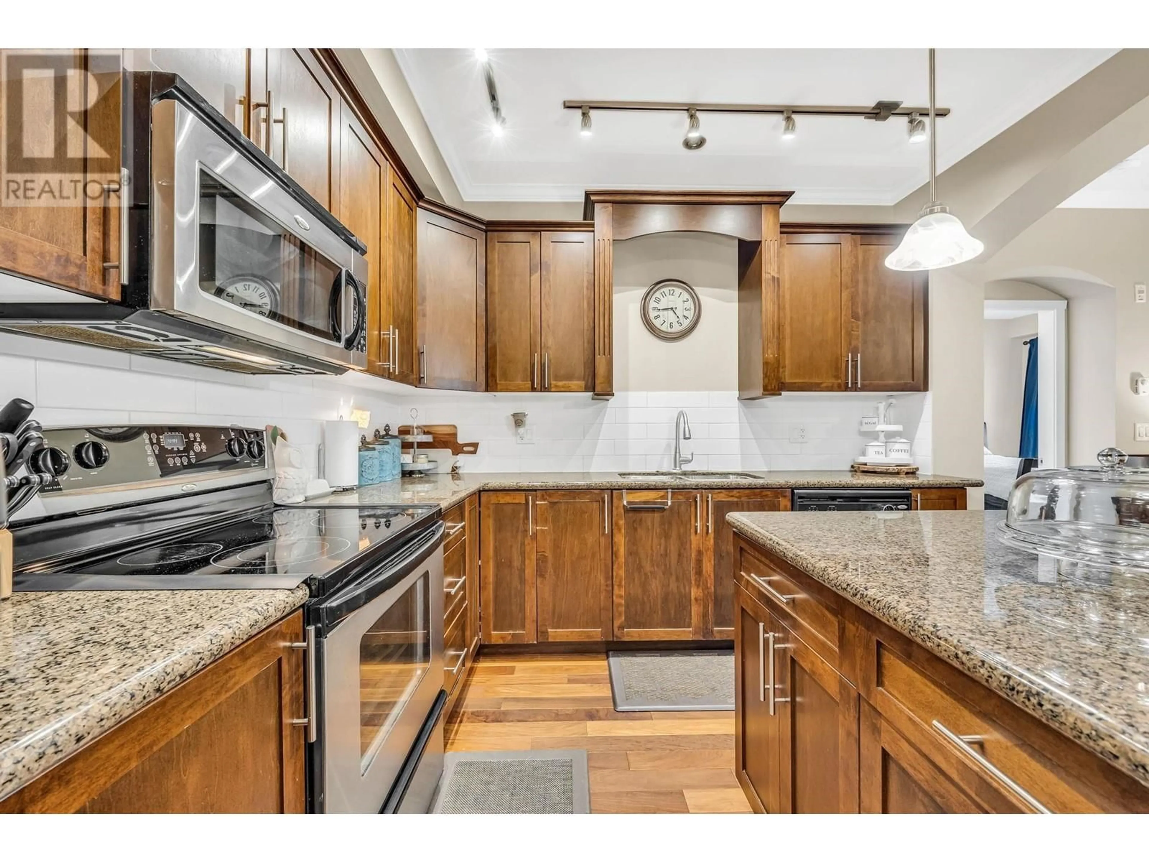Open concept kitchen, ceramic/tile floor for 206 - 2627 SHAUGHNESSY STREET, Port Coquitlam British Columbia V3C0E1