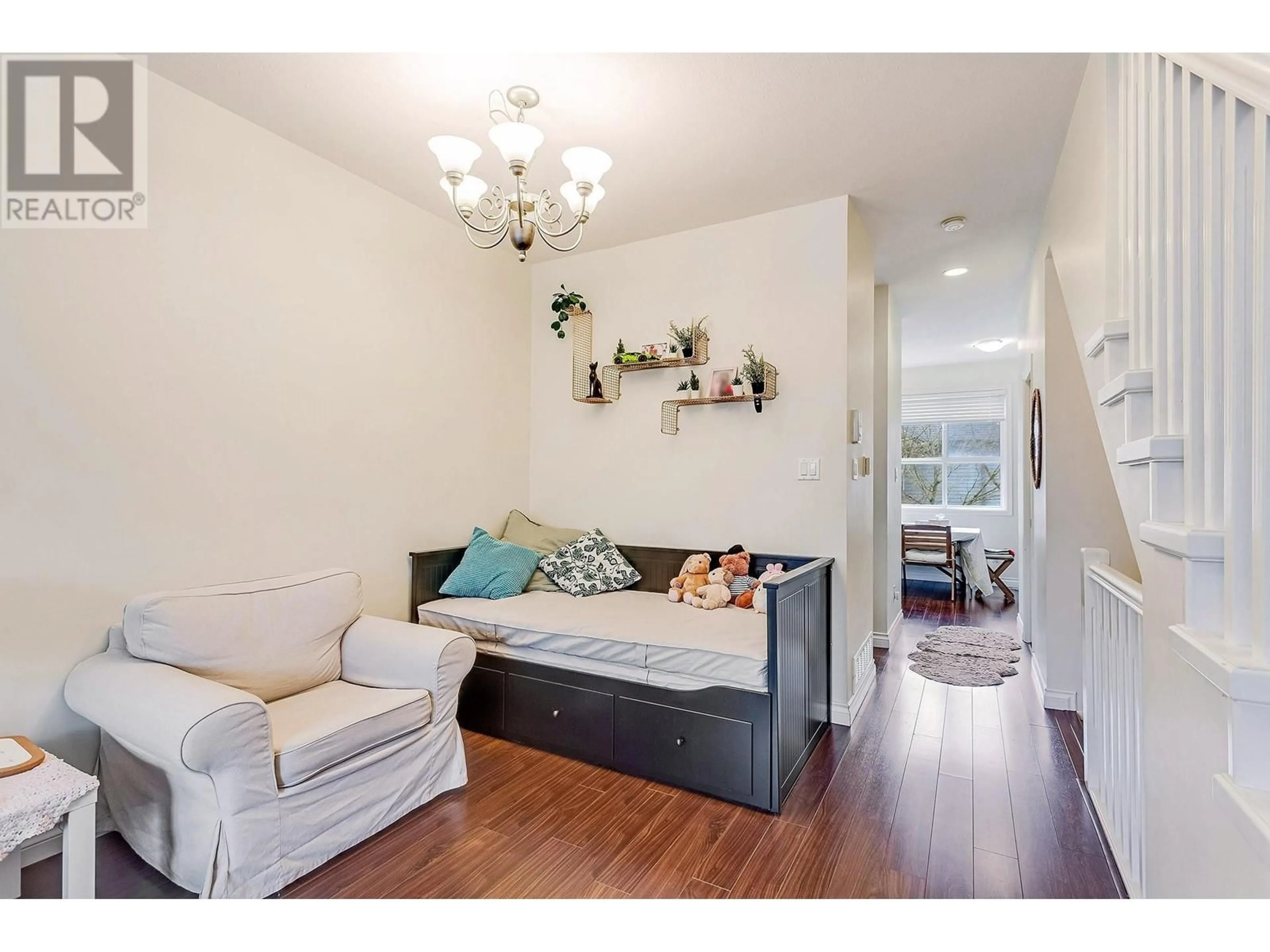 Living room with furniture, wood/laminate floor for 7 - 6811 LIVINGSTONE PLACE, Richmond British Columbia V7C5V8