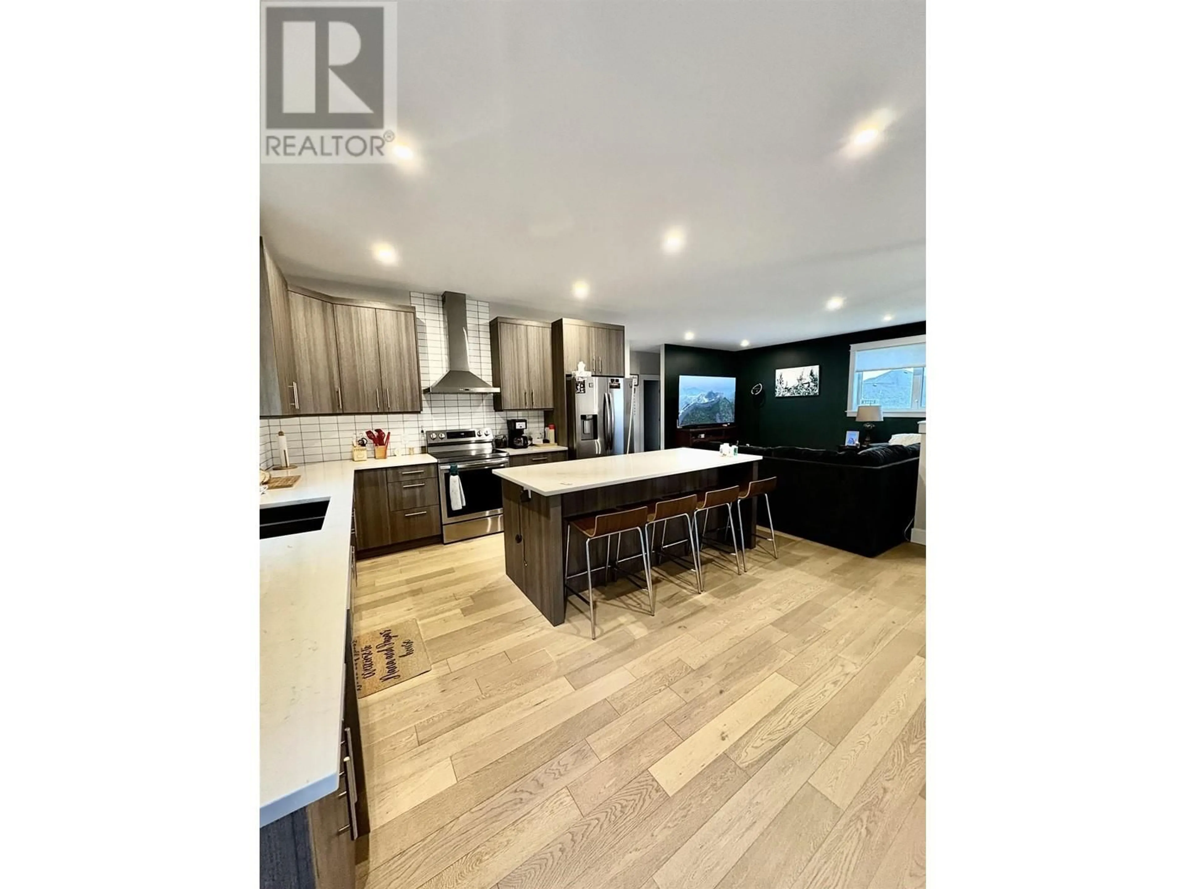 Open concept kitchen, wood/laminate floor for 49 WOZNEY STREET, Kitimat British Columbia V8C2S2