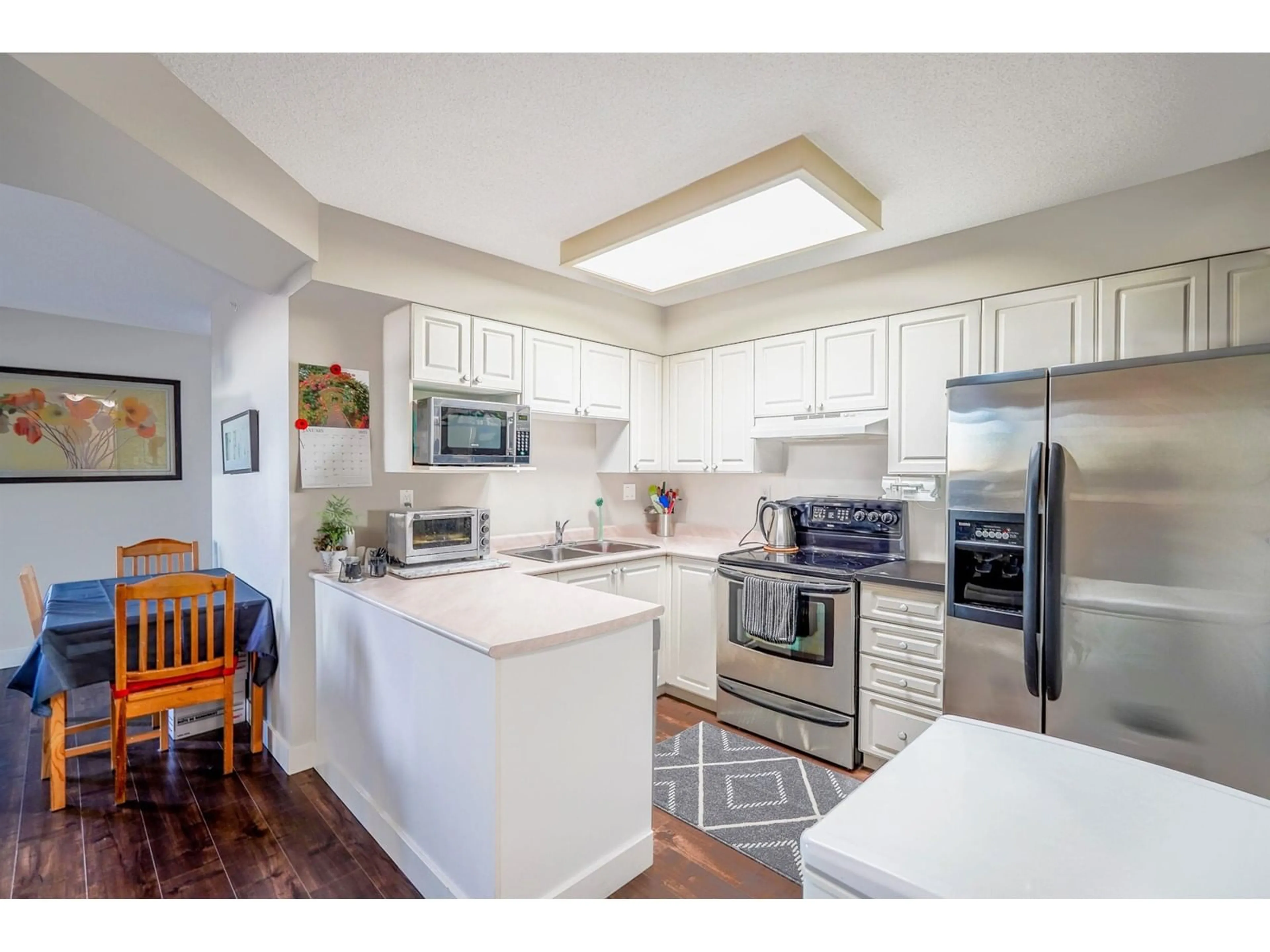 Open concept kitchen, unknown for 1106 - 13880 101, Surrey British Columbia V3T5T1