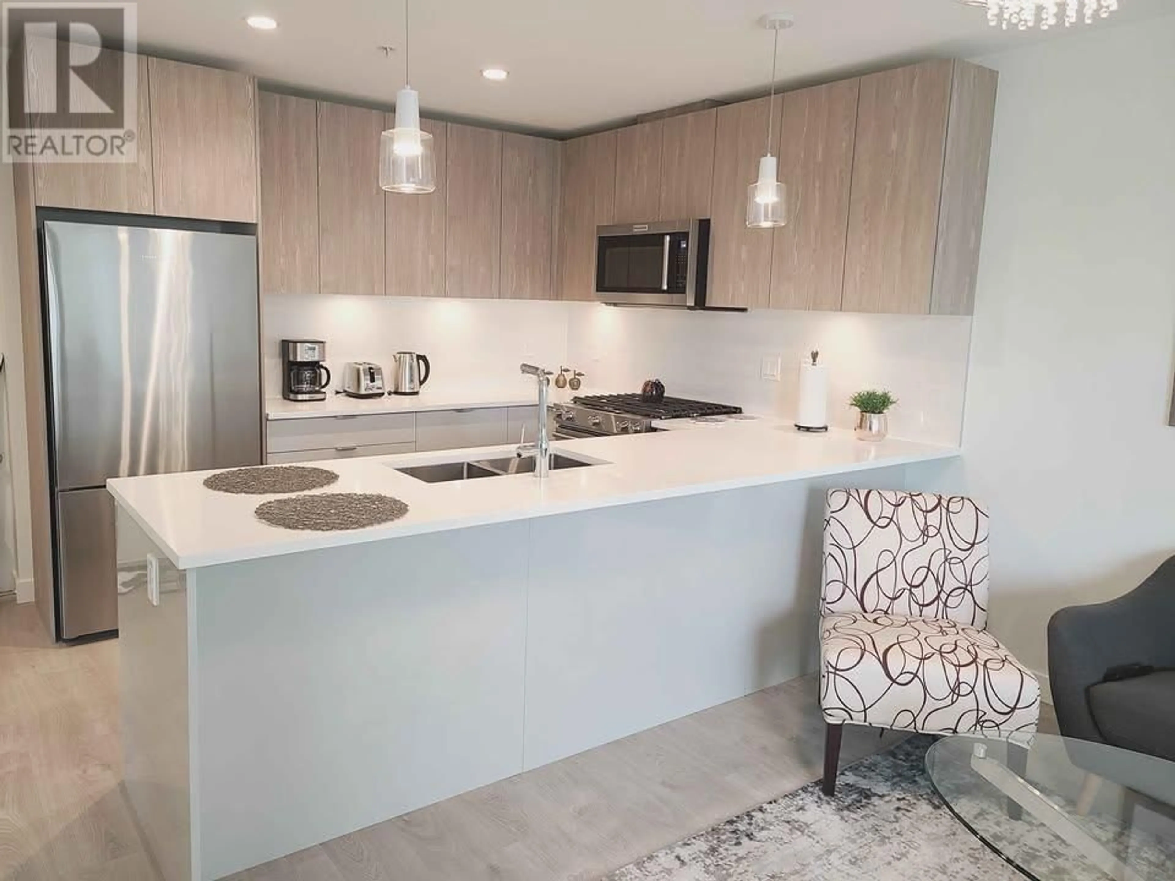 Open concept kitchen, unknown for 514 - 108 8TH STREET, North Vancouver British Columbia V7L0H1