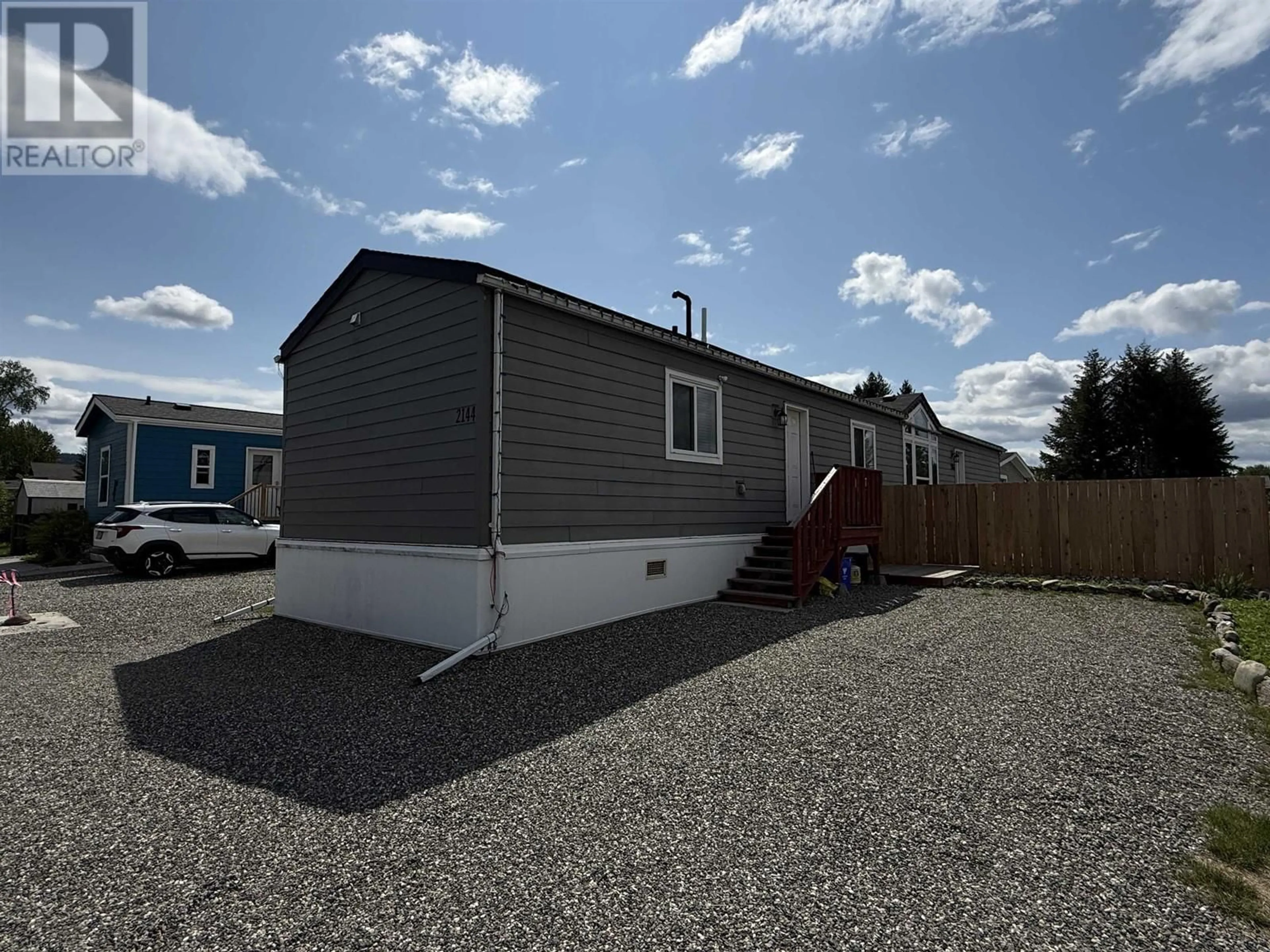Home with vinyl exterior material, street for 2144 GOLDEN POND ROAD, Quesnel British Columbia V2J7A2