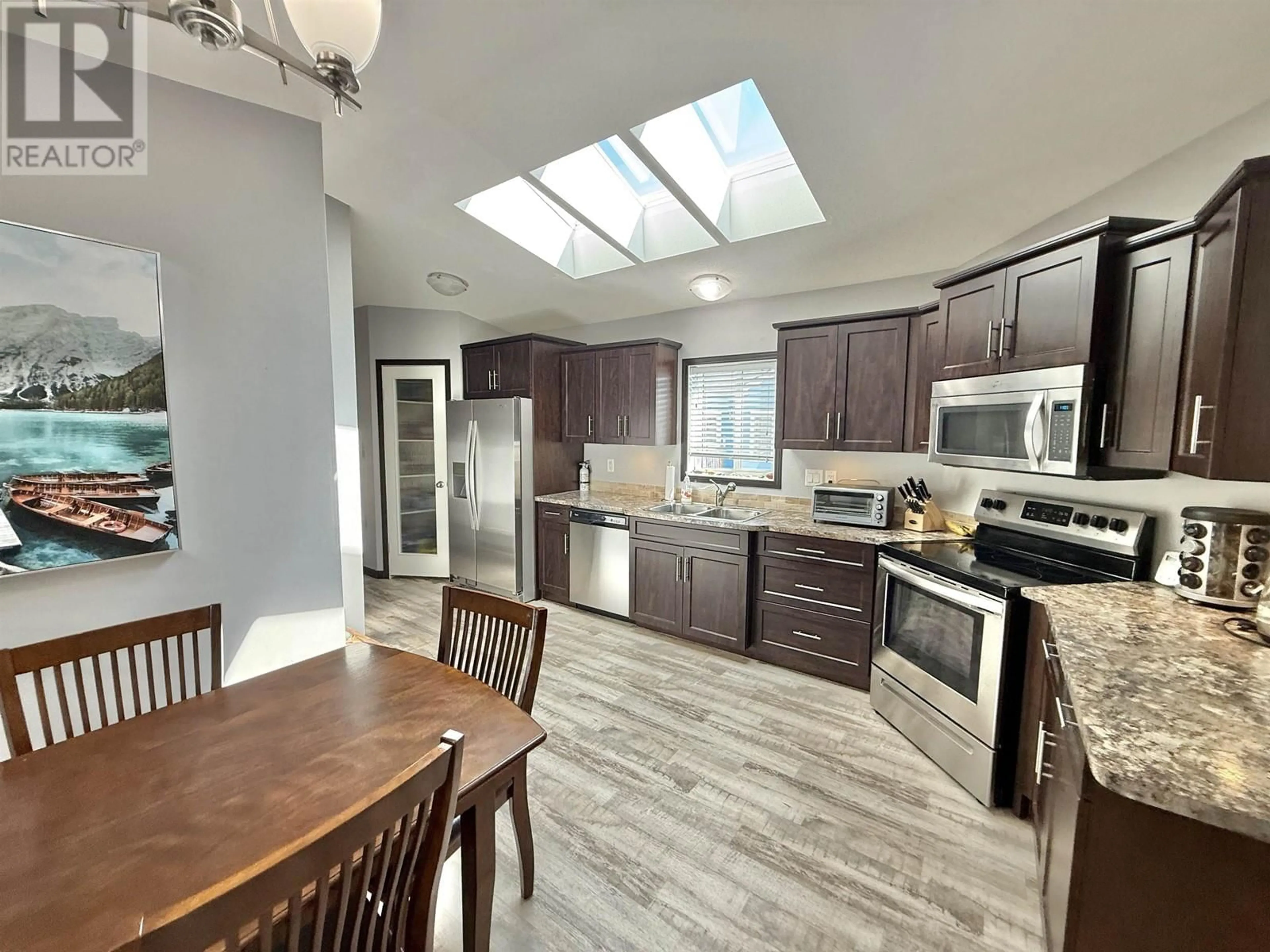 Open concept kitchen, ceramic/tile floor for 2144 GOLDEN POND ROAD, Quesnel British Columbia V2J7A2