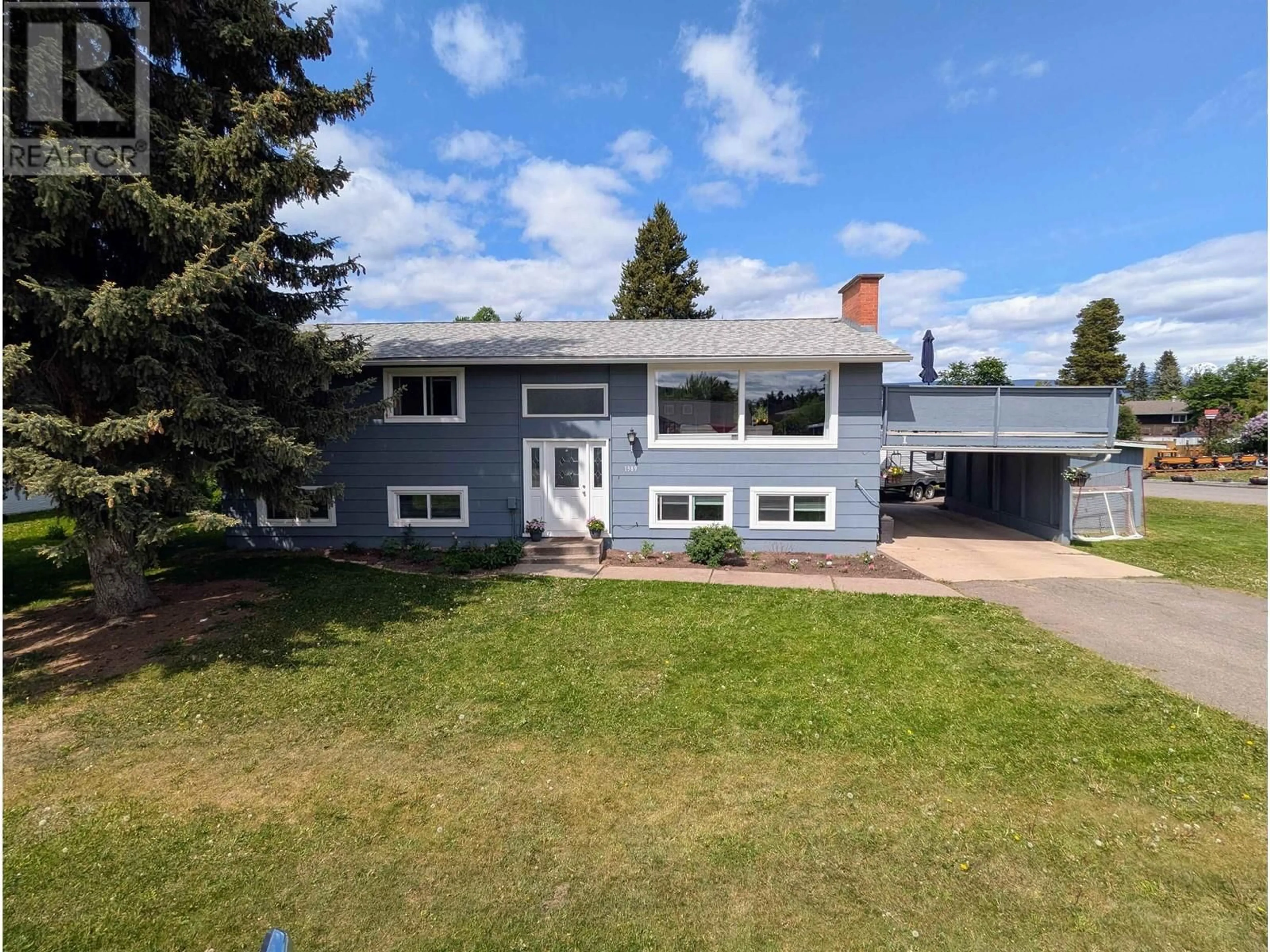 A pic from outside/outdoor area/front of a property/back of a property/a pic from drone, street for 1389 MORICE DRIVE, Smithers British Columbia V0J2N0