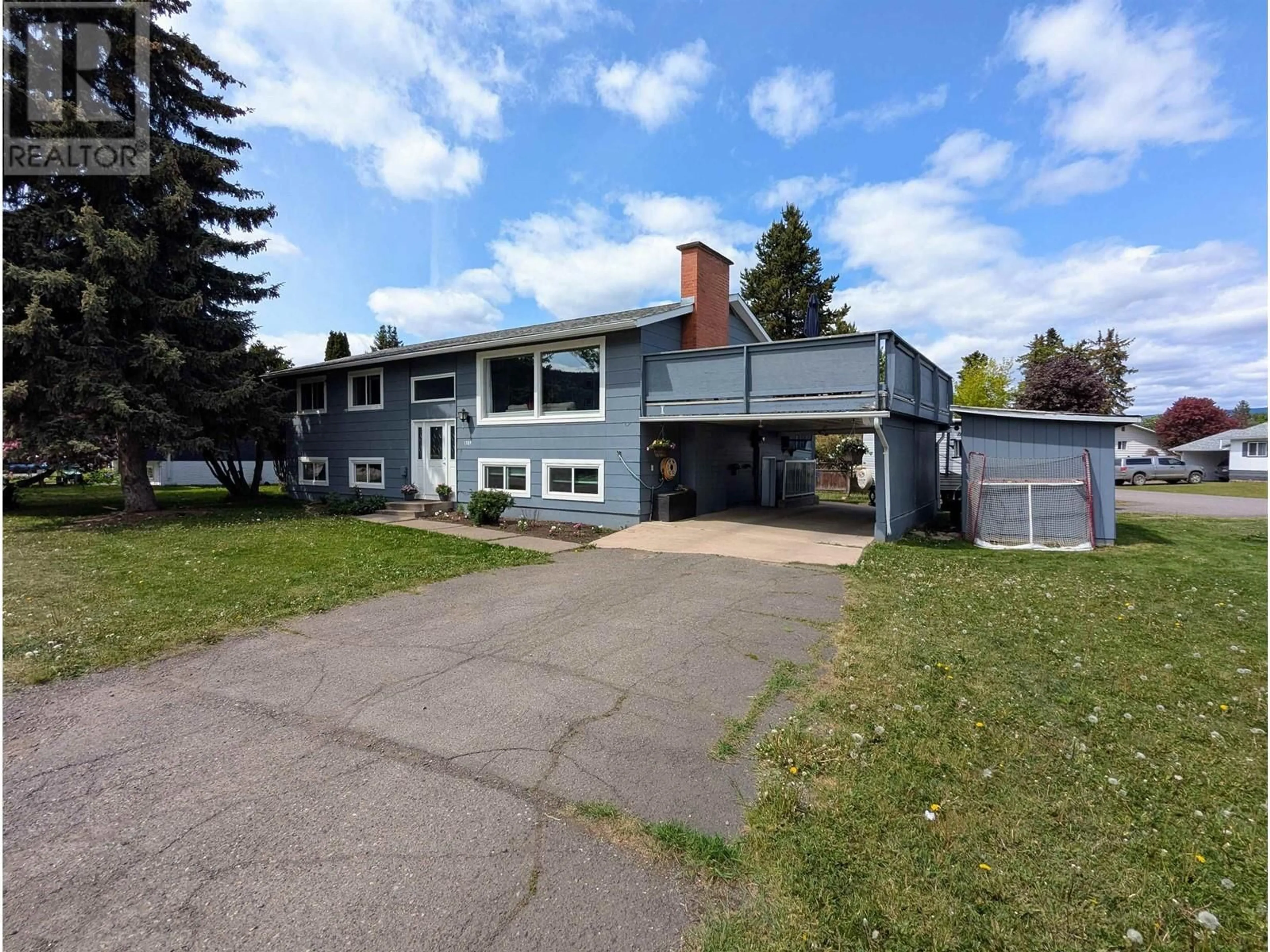 Home with vinyl exterior material, street for 1389 MORICE DRIVE, Smithers British Columbia V0J2N0