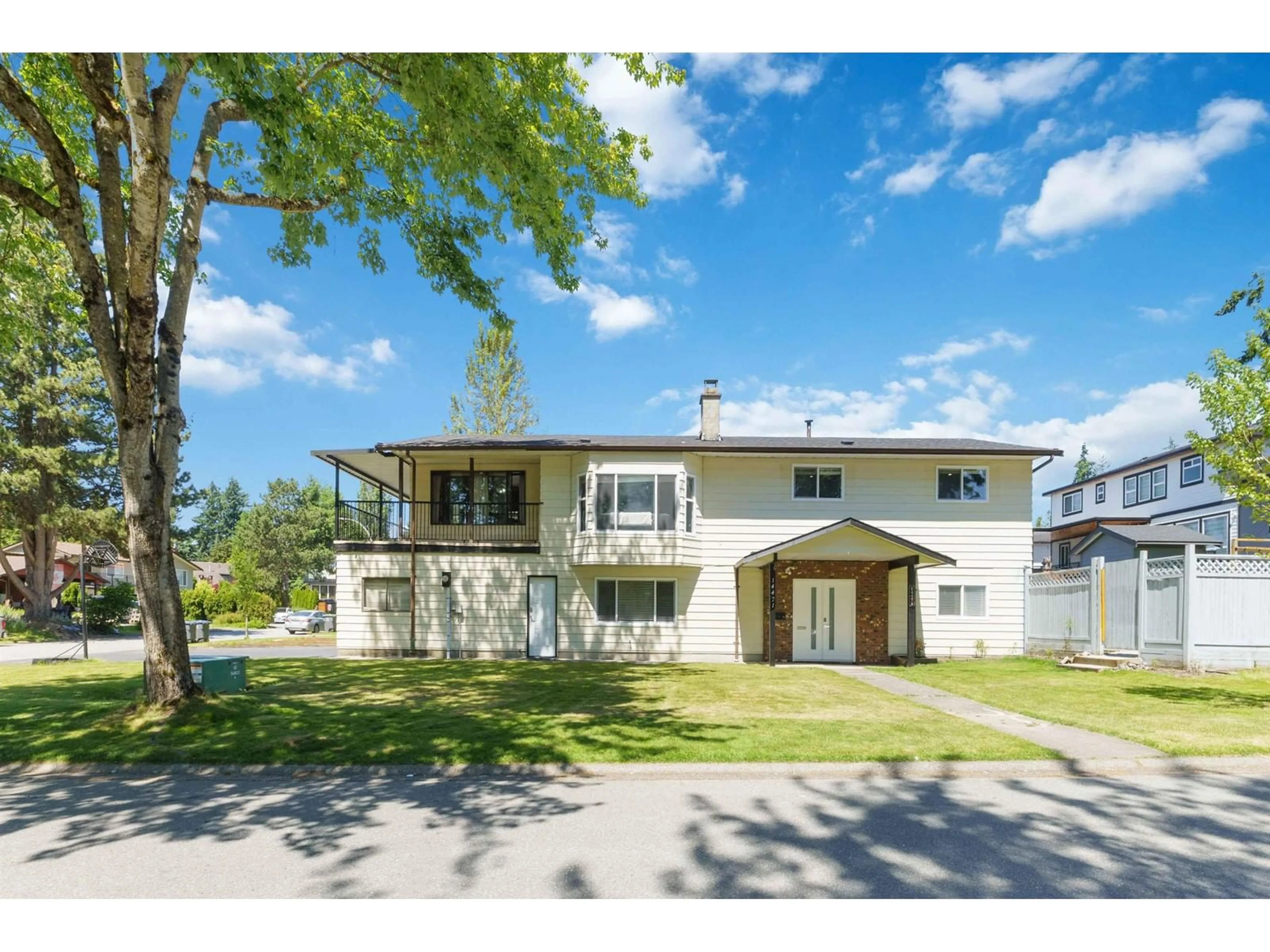 Home with vinyl exterior material, street for 14471 85A, Surrey British Columbia V3S5W3