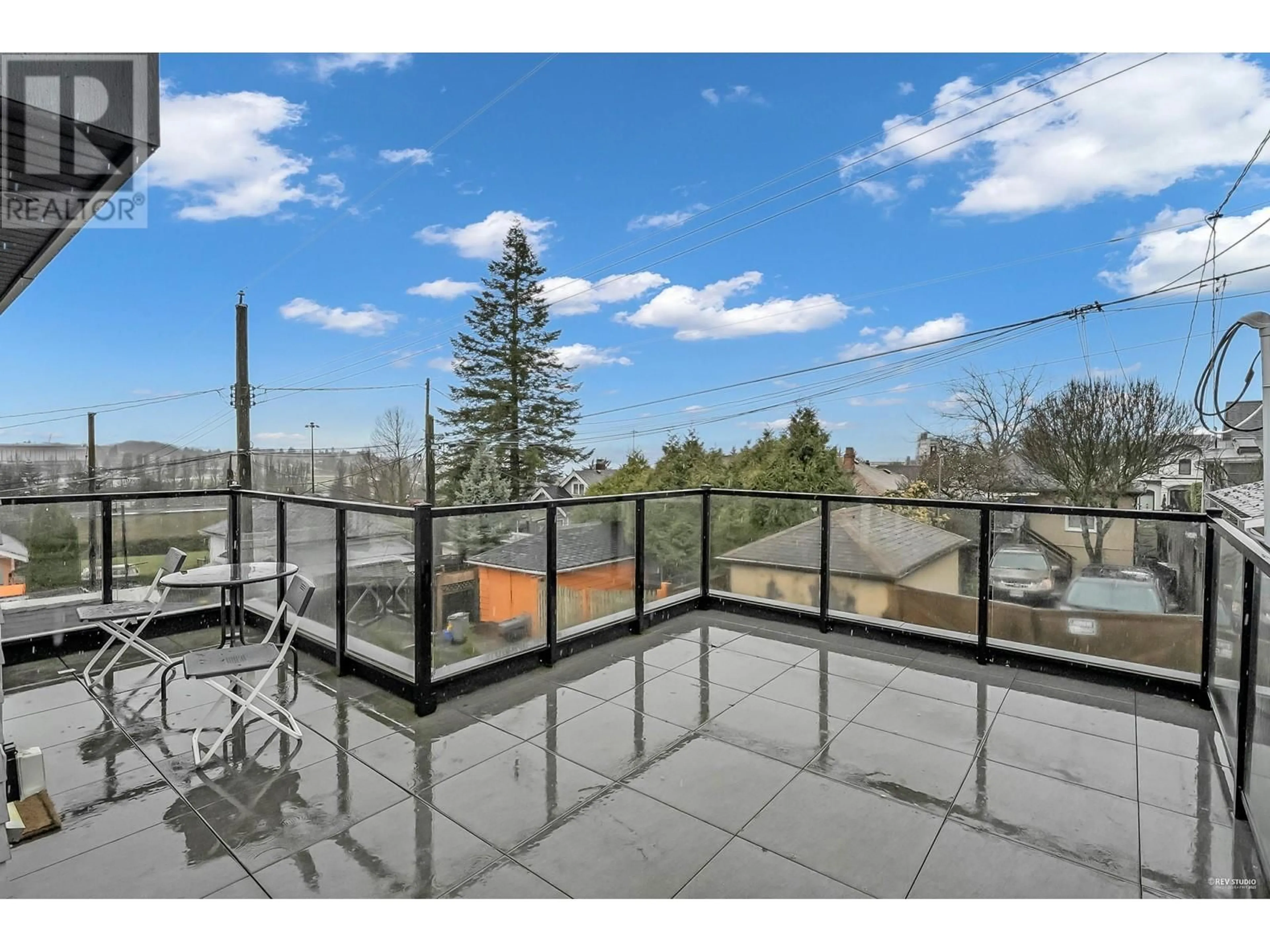 Patio, city buildings view from balcony for 3429 DUNDAS STREET, Vancouver British Columbia V5K1R9