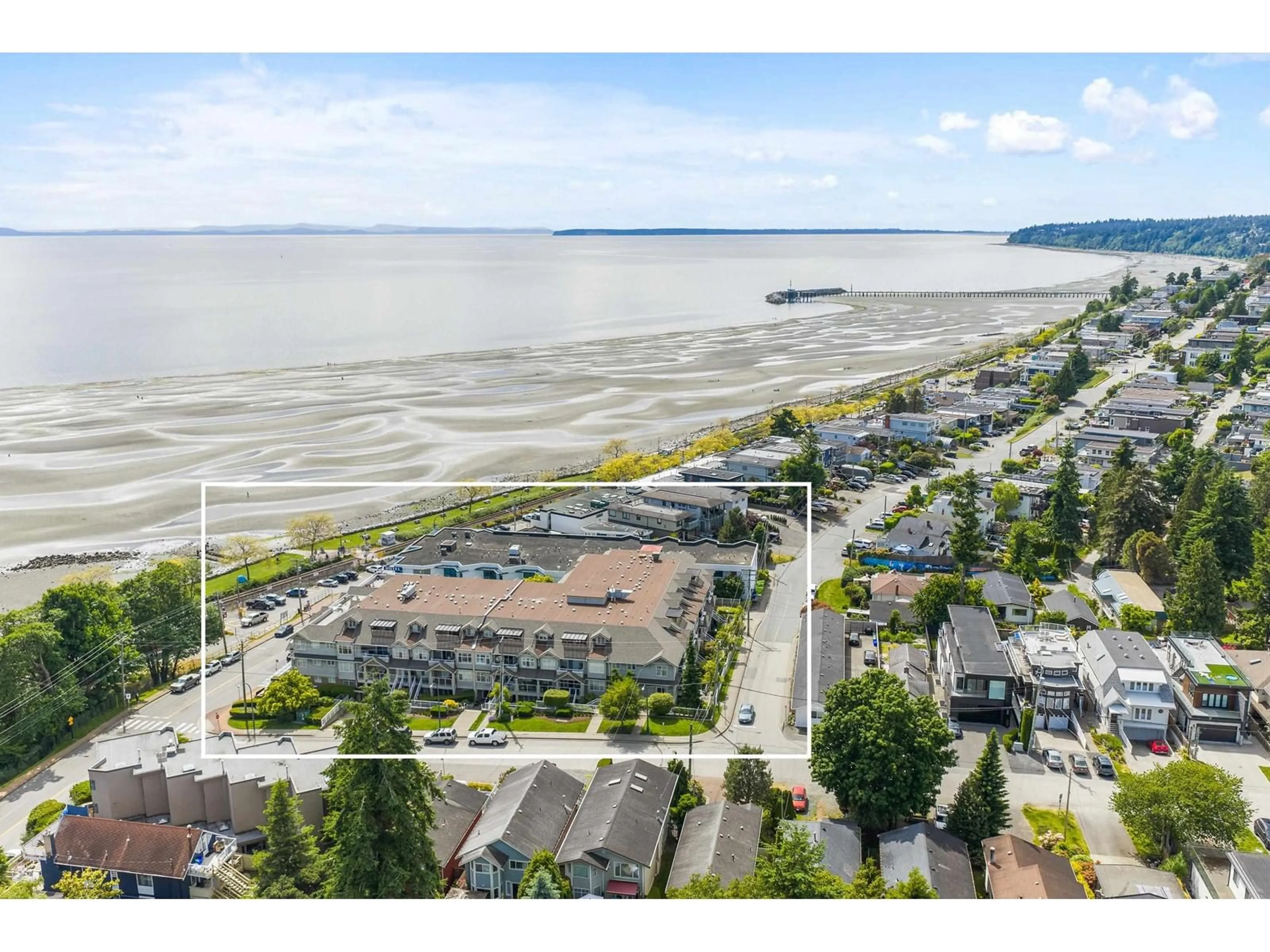 A pic from outside/outdoor area/front of a property/back of a property/a pic from drone, water/lake/river/ocean view for 406 - 15621 MARINE, White Rock British Columbia V4B1E1