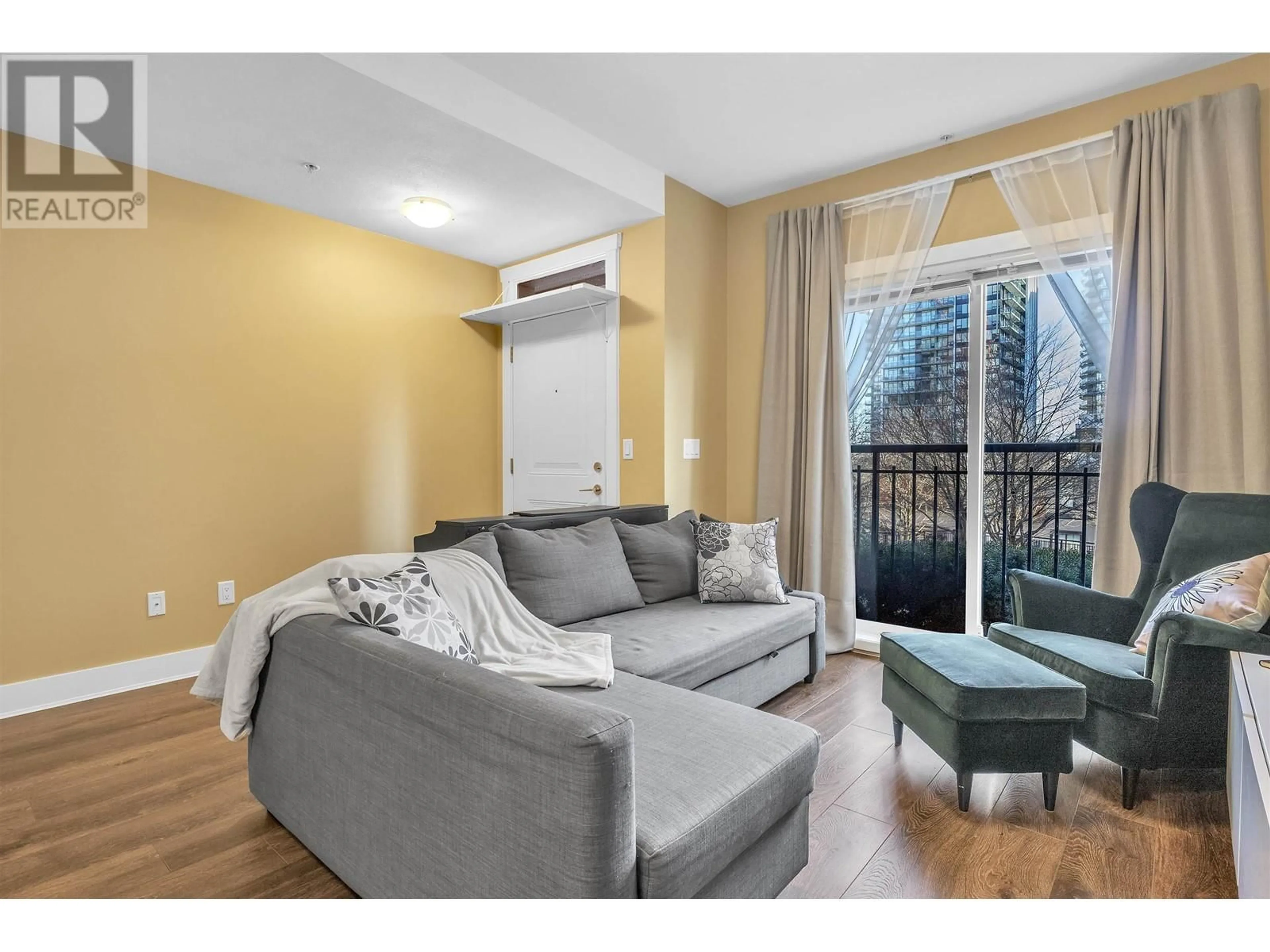Living room with furniture, unknown for 203 - 828 ROYAL AVENUE, New Westminster British Columbia V3M1J9