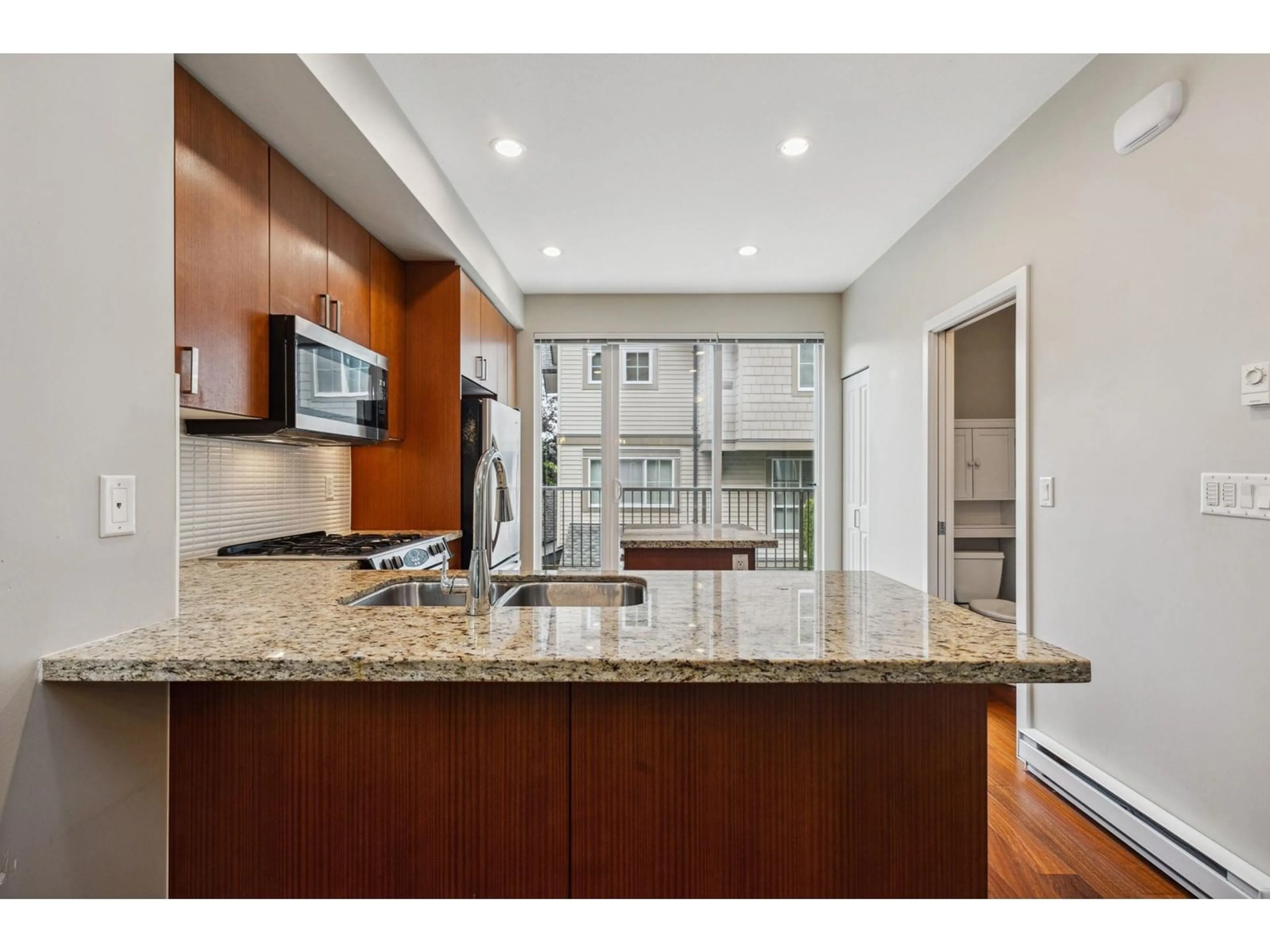 Open concept kitchen, unknown for 257 - 2501 161A, Surrey British Columbia V3Z7Y6