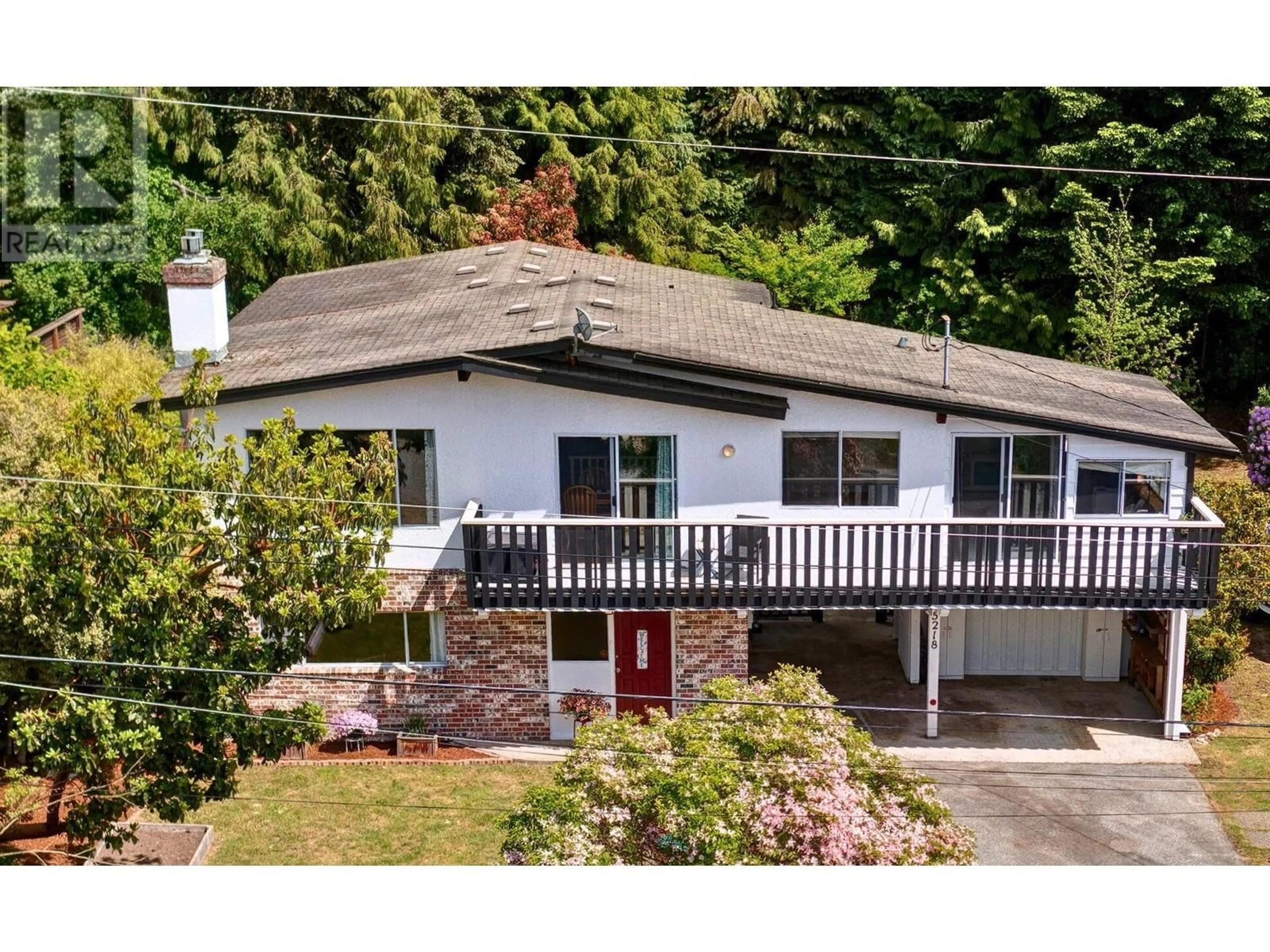 A pic from outside/outdoor area/front of a property/back of a property/a pic from drone, street for 5218 RADCLIFFE ROAD, Sechelt British Columbia V7Z0C1