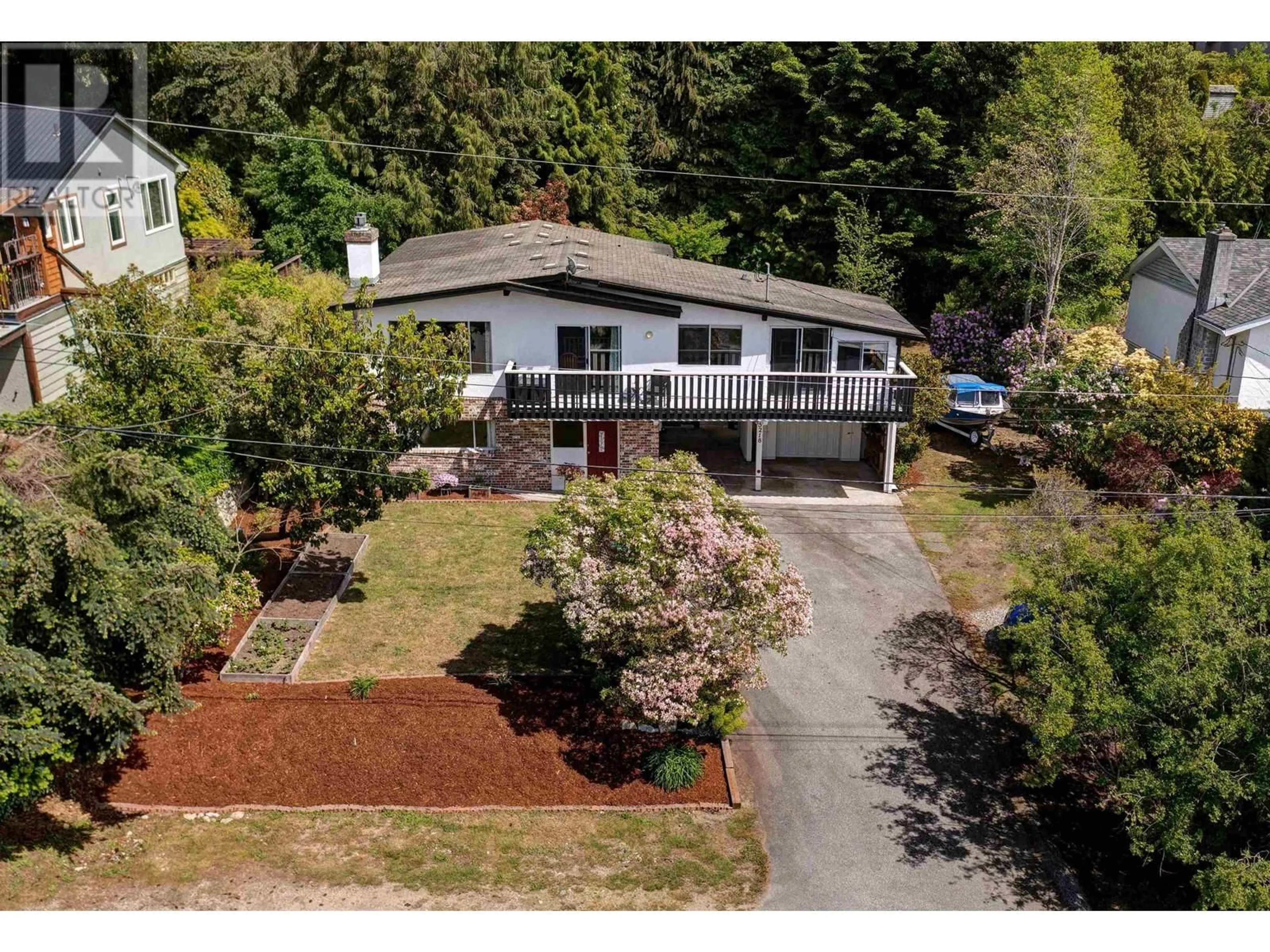 A pic from outside/outdoor area/front of a property/back of a property/a pic from drone, unknown for 5218 RADCLIFFE ROAD, Sechelt British Columbia V7Z0C1