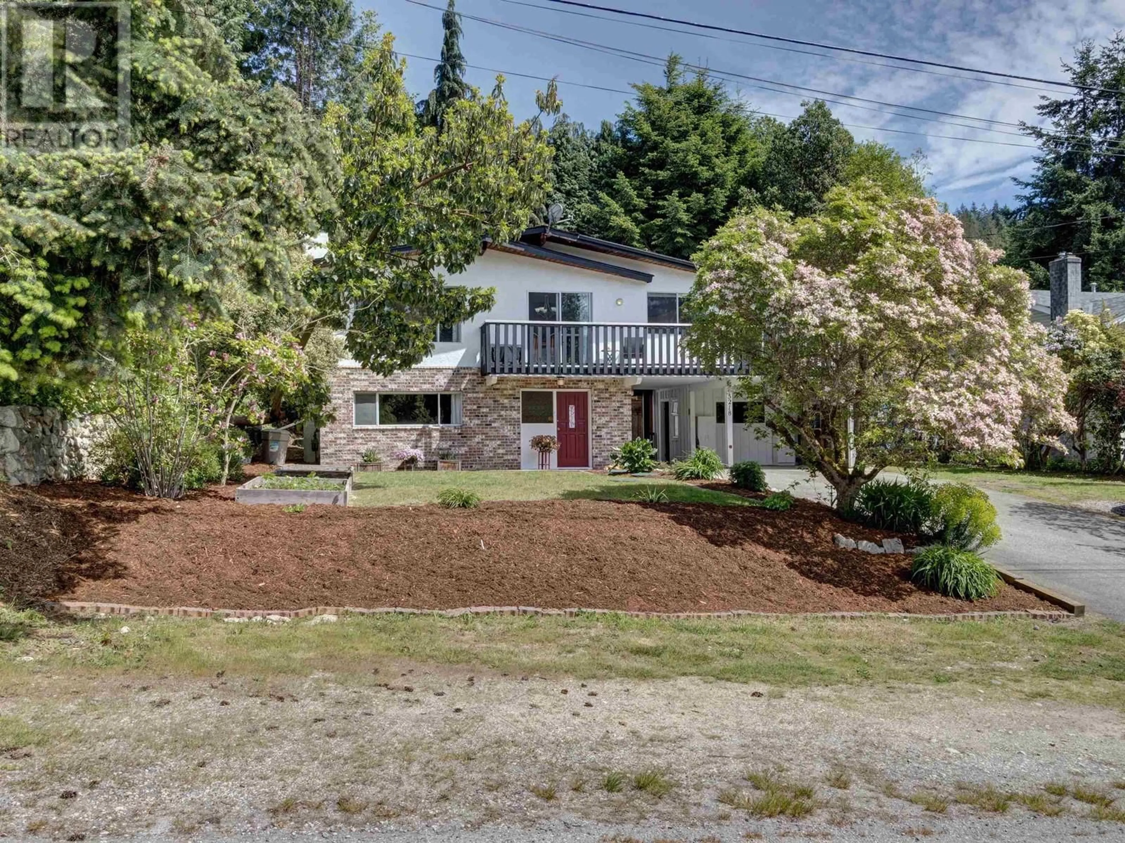 A pic from outside/outdoor area/front of a property/back of a property/a pic from drone, street for 5218 RADCLIFFE ROAD, Sechelt British Columbia V7Z0C1