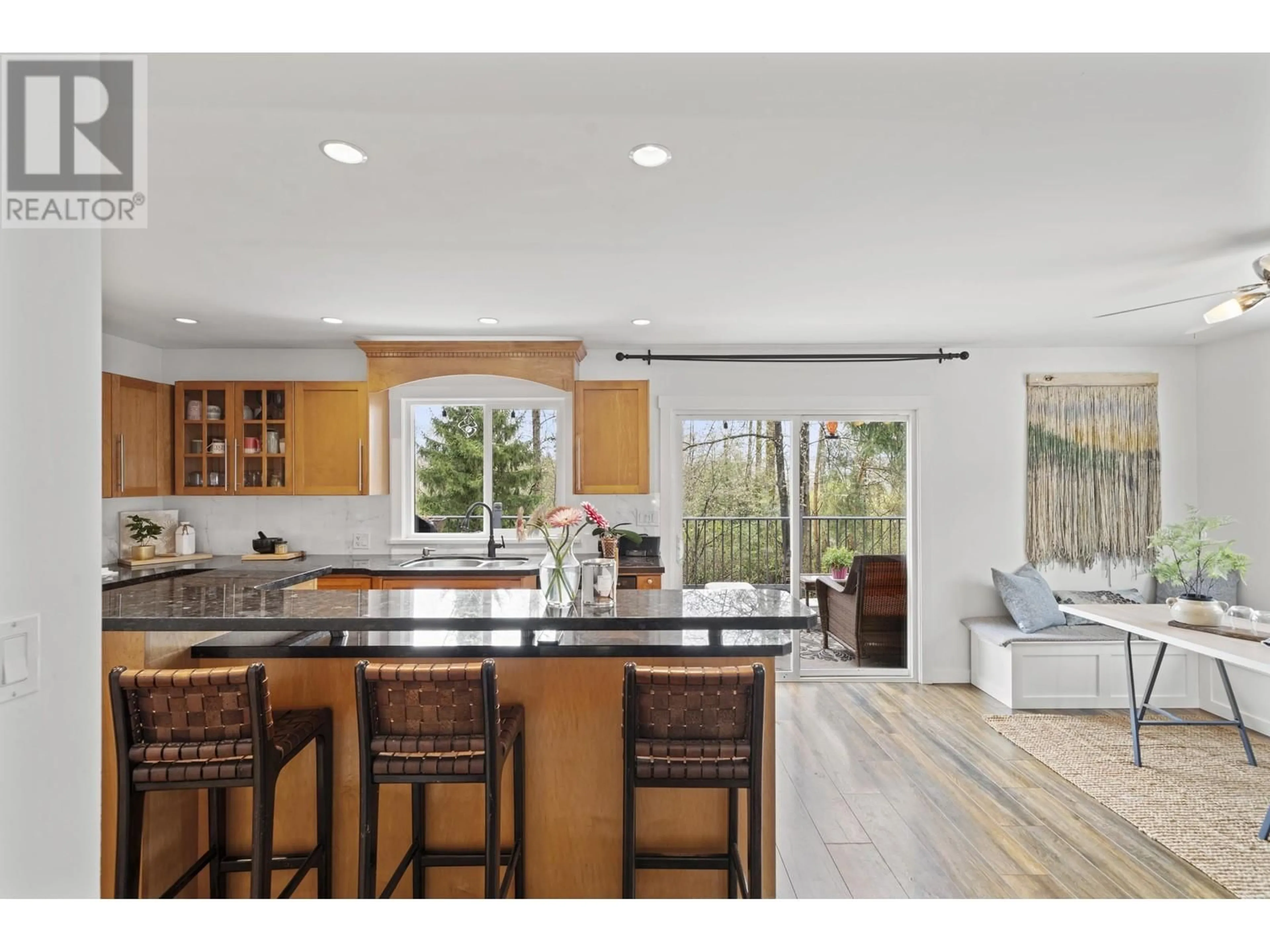Open concept kitchen, wood/laminate floor for 11580 WILDWOOD CRESCENT, Pitt Meadows British Columbia V3Y1M9