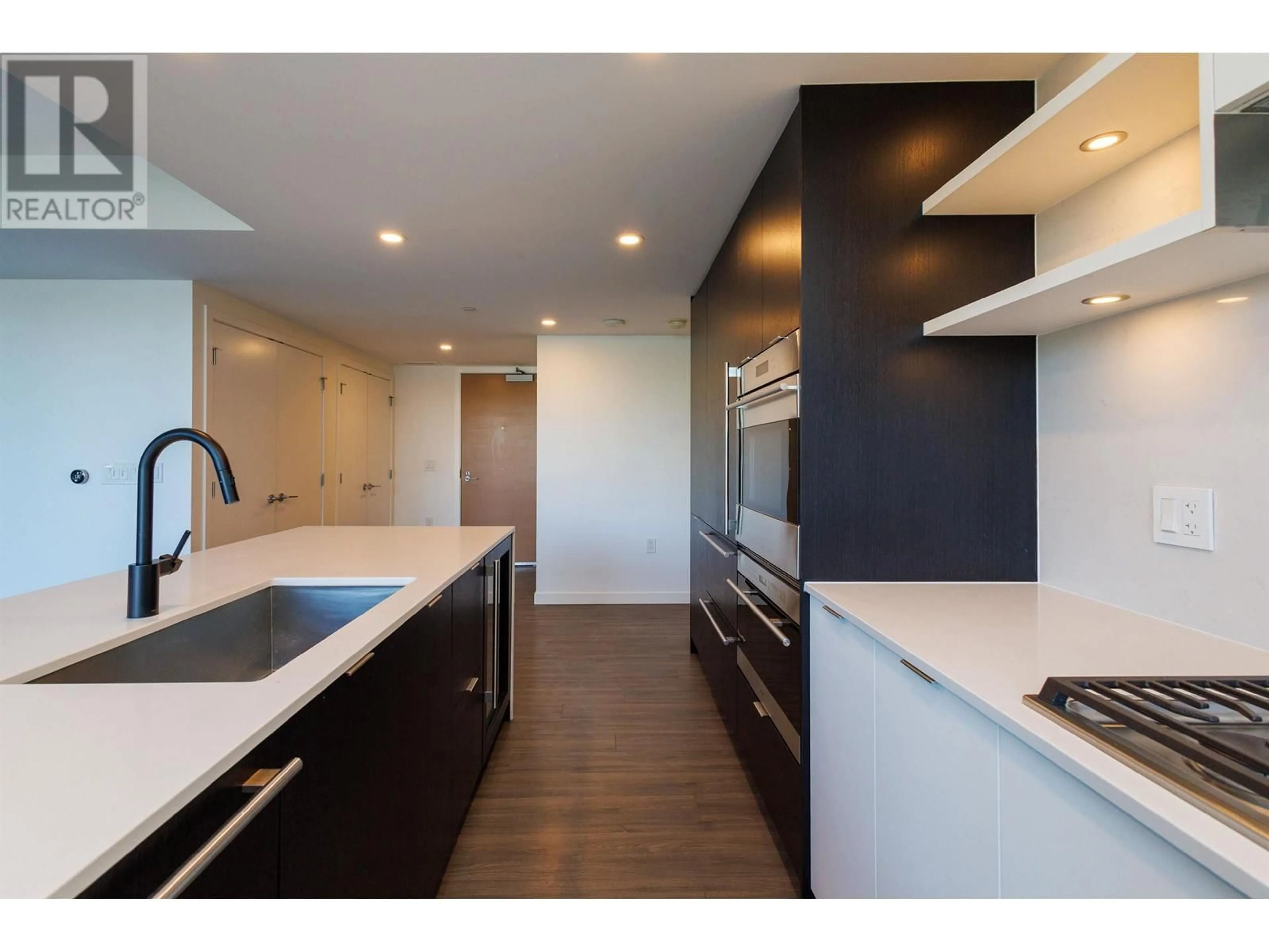 Open concept kitchen, unknown for 303 - 210 5TH AVENUE, Vancouver British Columbia V5T0K1