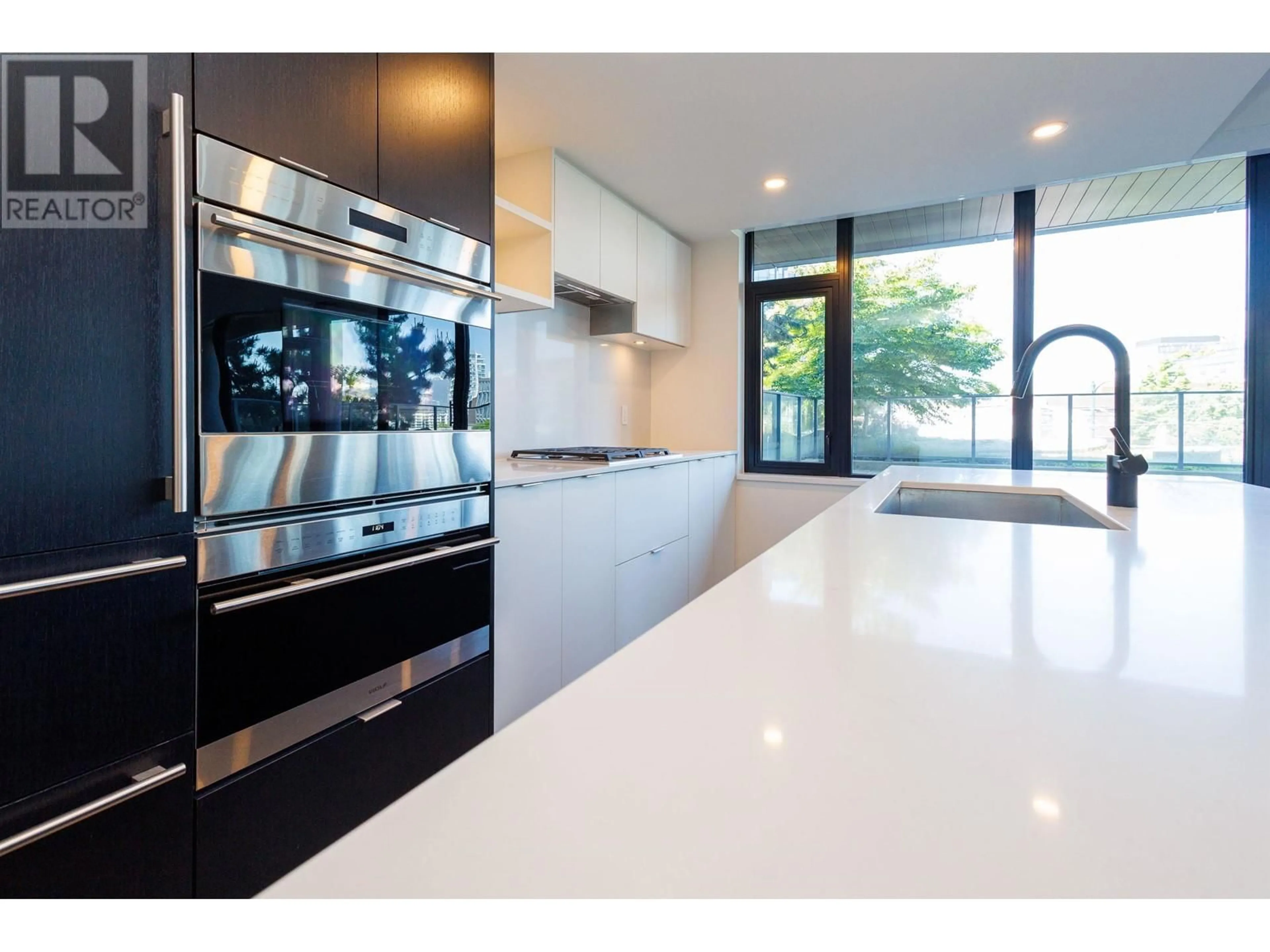 Contemporary kitchen, ceramic/tile floor for 303 - 210 5TH AVENUE, Vancouver British Columbia V5T0K1