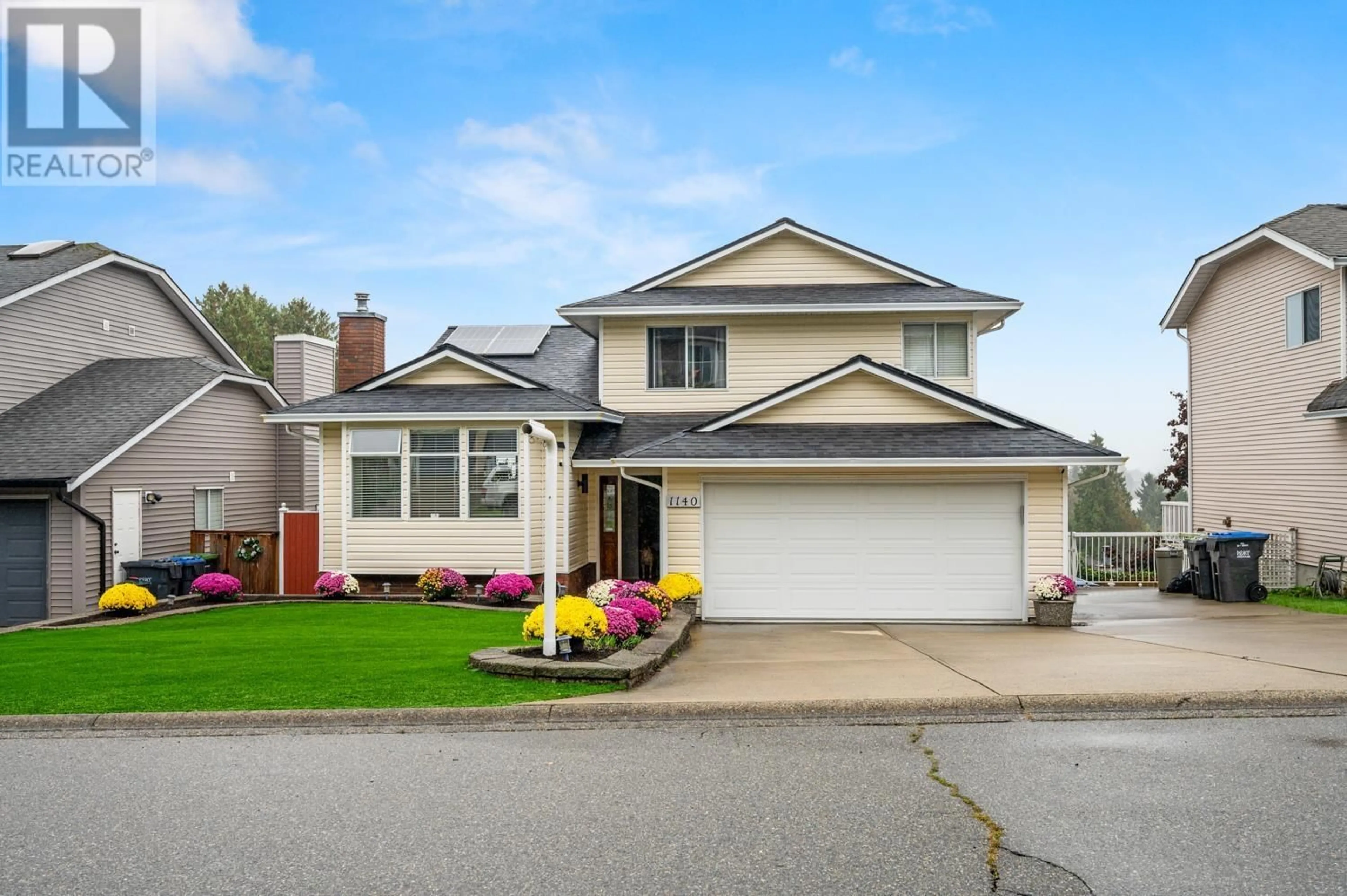 Home with vinyl exterior material, street for 1140 FRASERVIEW STREET, Port Coquitlam British Columbia V3C5H1