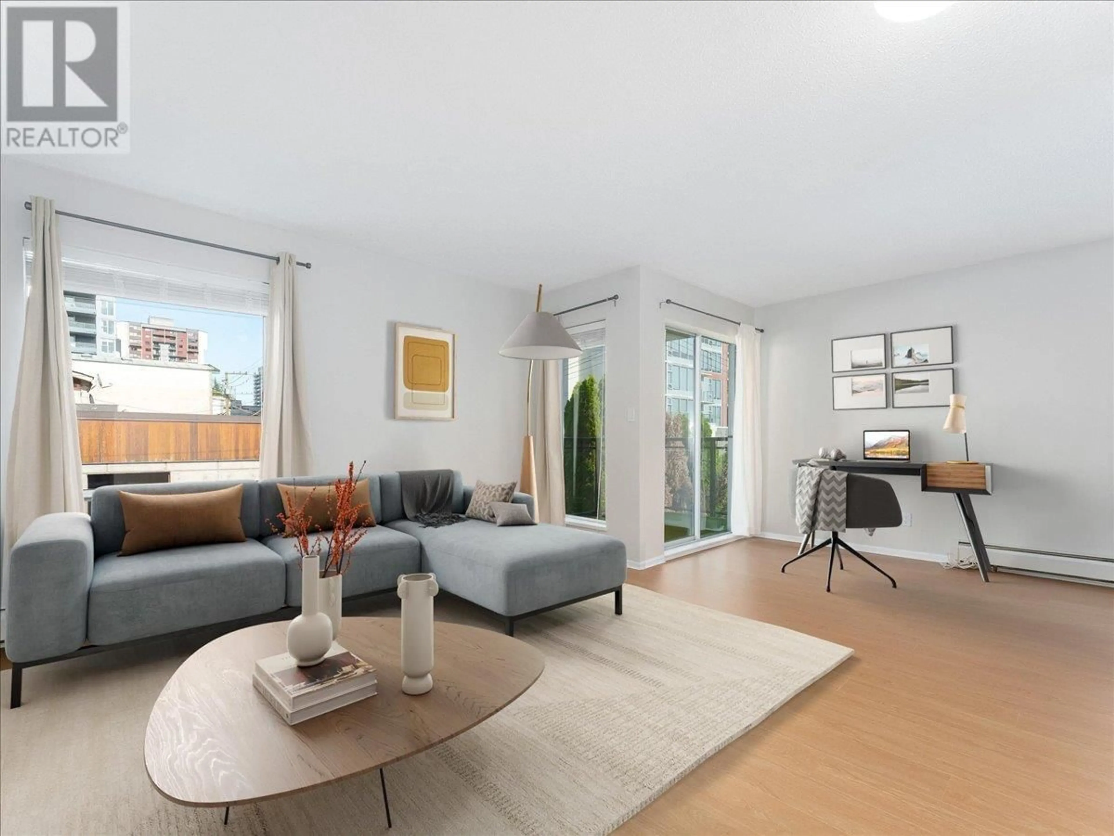 Living room with furniture, unknown for 202 - 1550 CHESTERFIELD AVENUE, North Vancouver British Columbia V7M2N6