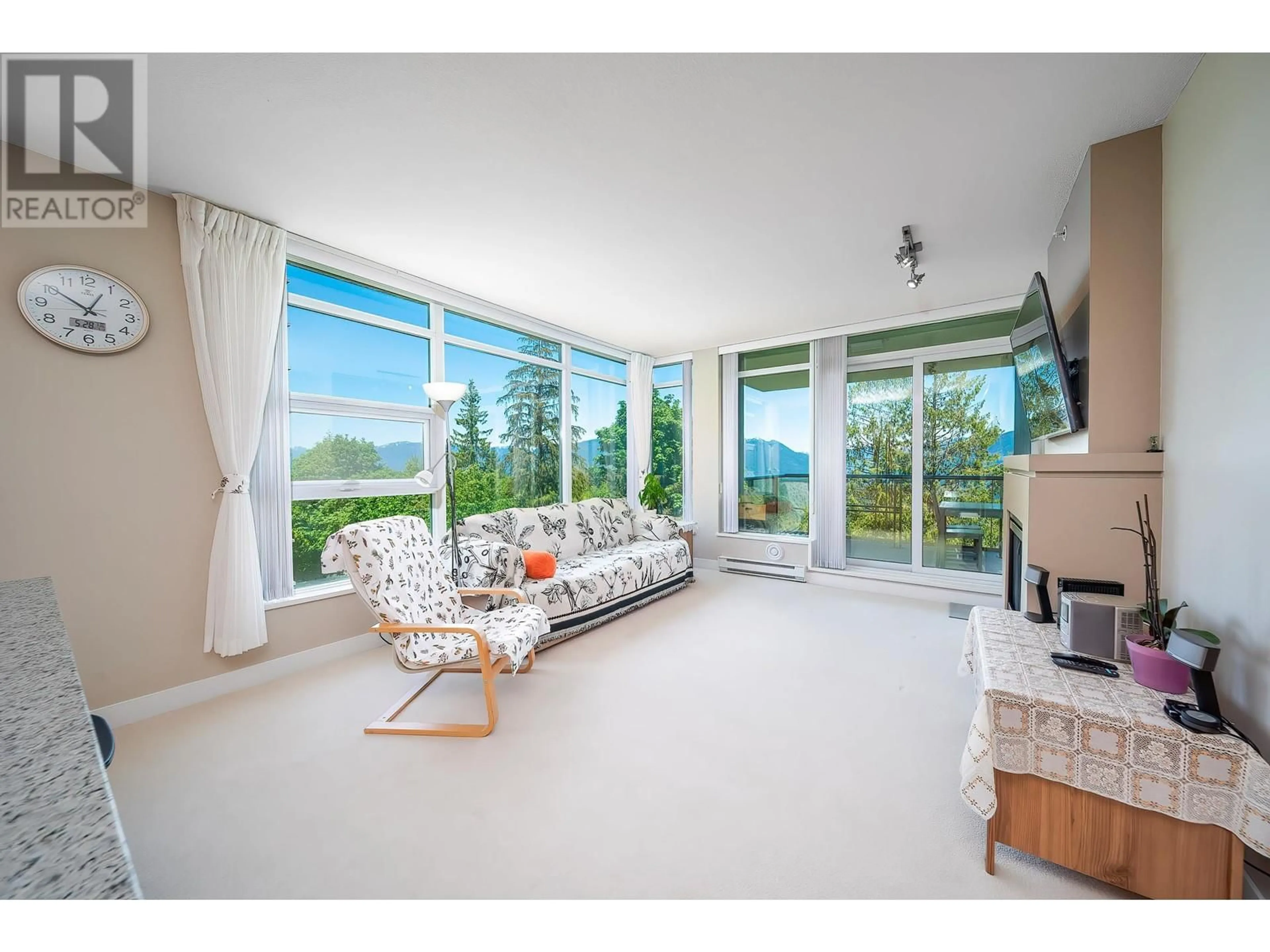 Living room with furniture, unknown for 701 - 9222 UNIVERSITY CRESCENT, Burnaby British Columbia V5A0A6