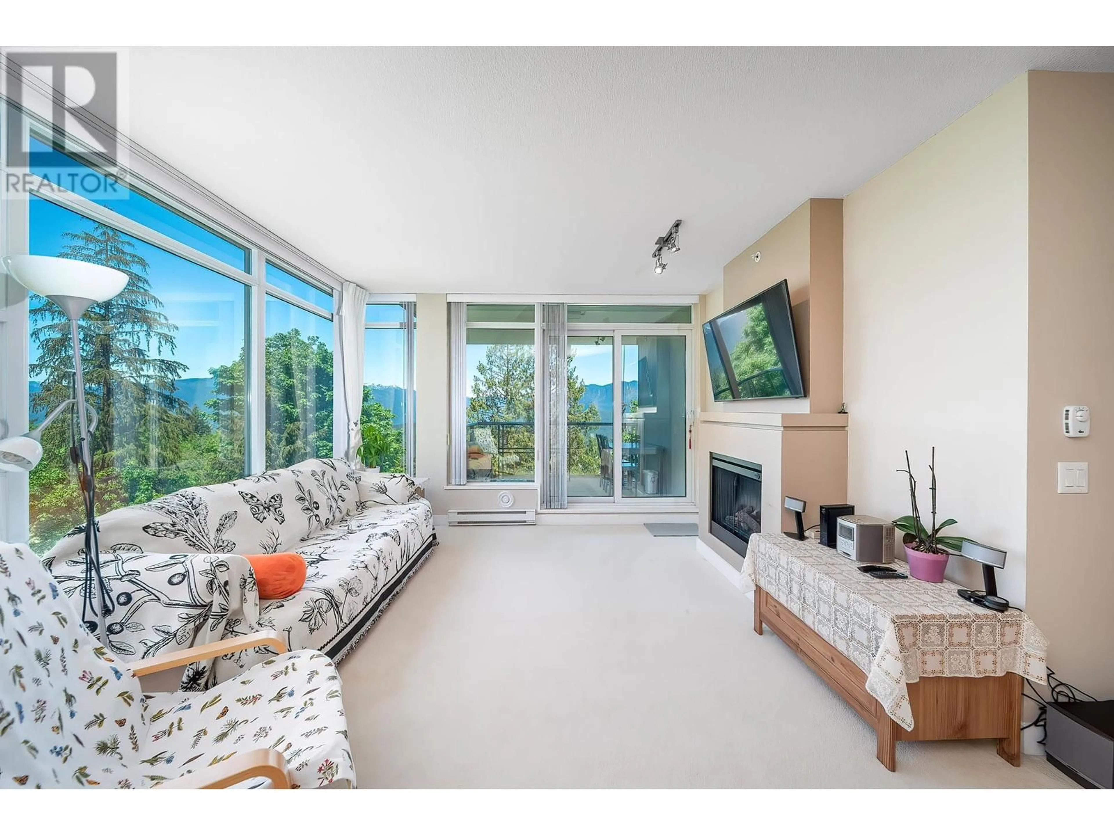 Living room with furniture, unknown for 701 - 9222 UNIVERSITY CRESCENT, Burnaby British Columbia V5A0A6