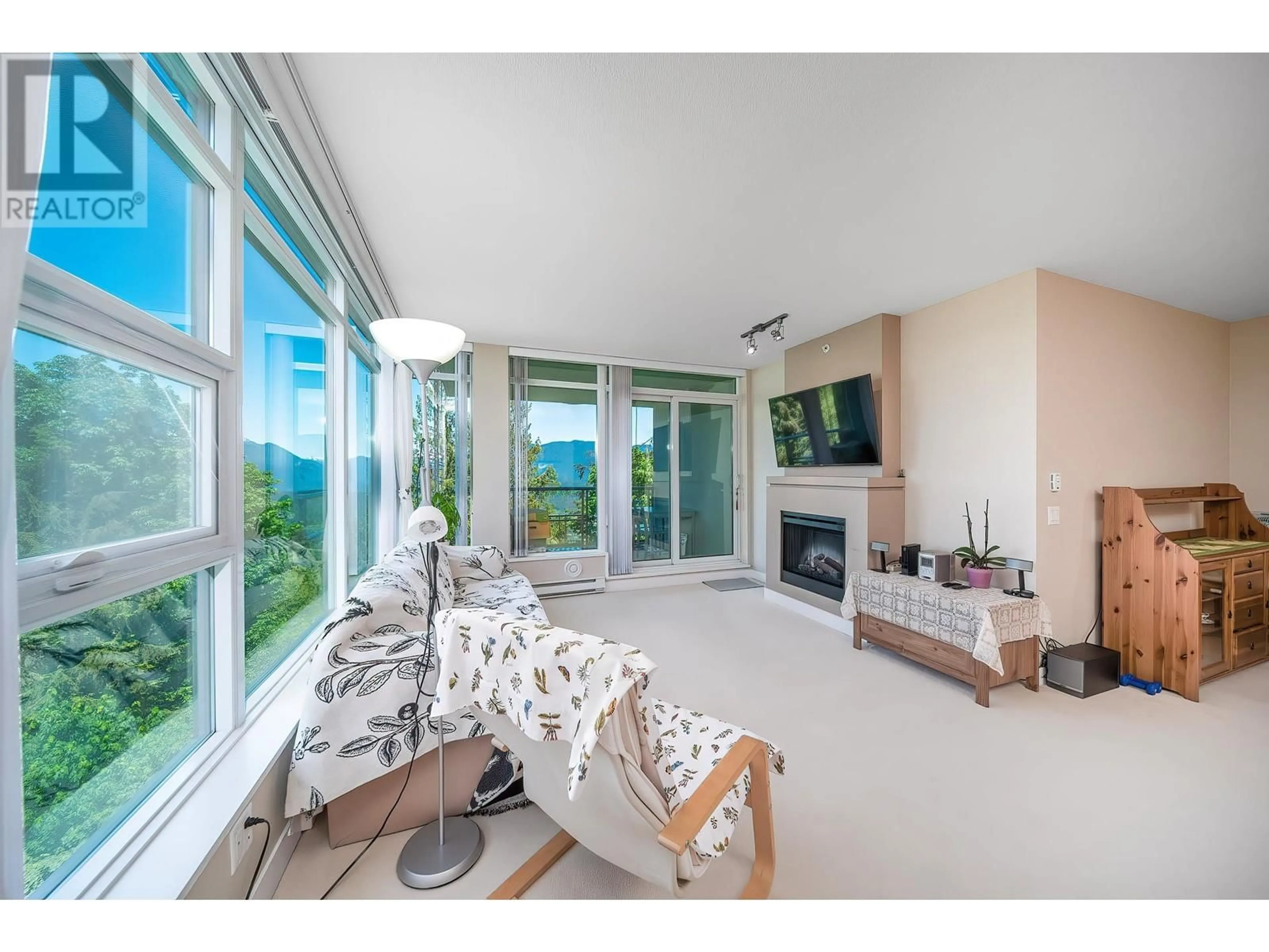 Living room with furniture, ceramic/tile floor for 701 - 9222 UNIVERSITY CRESCENT, Burnaby British Columbia V5A0A6
