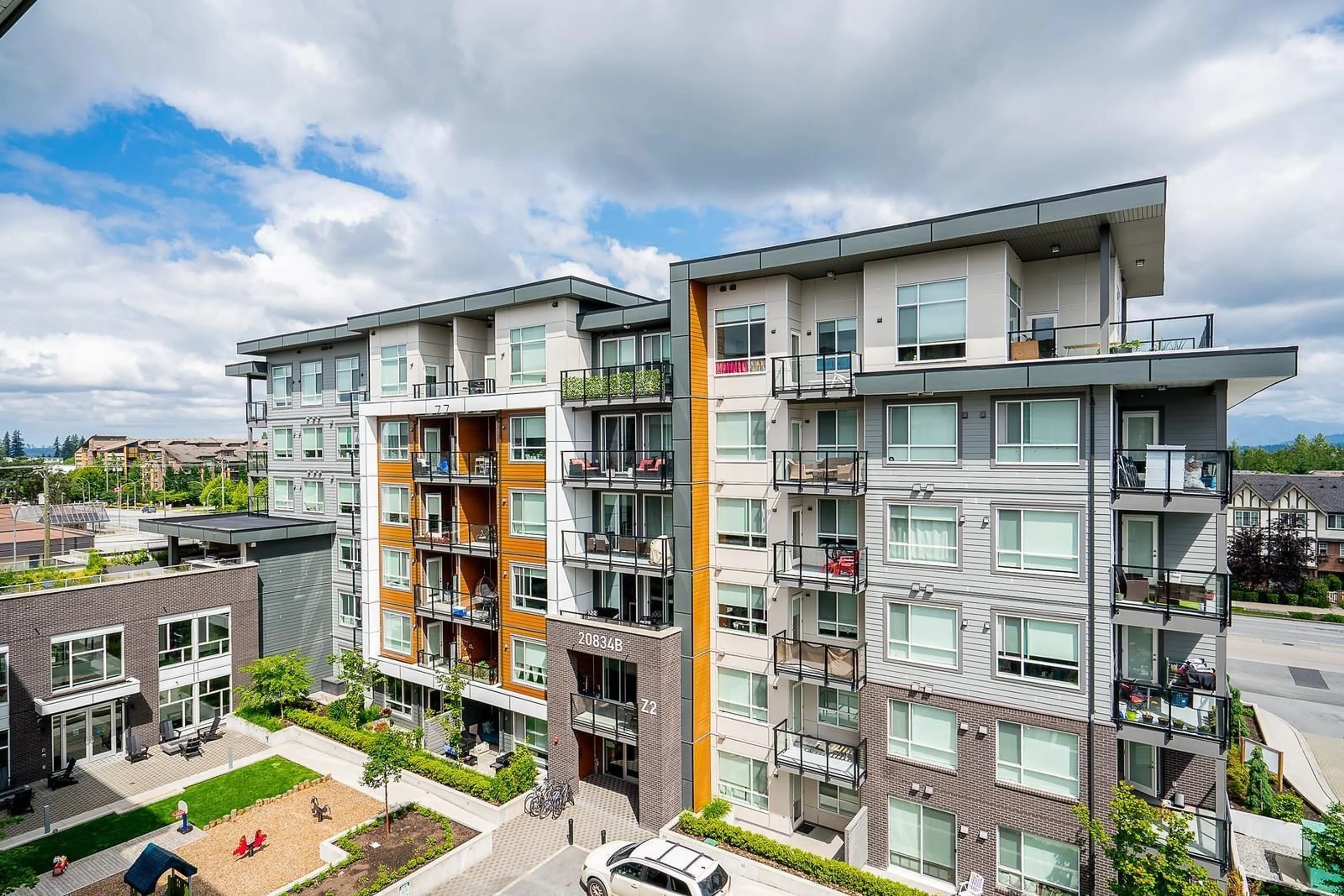 A pic from outside/outdoor area/front of a property/back of a property/a pic from drone, city buildings view from balcony for B502 - 20834 80, Langley British Columbia V2Y3M5