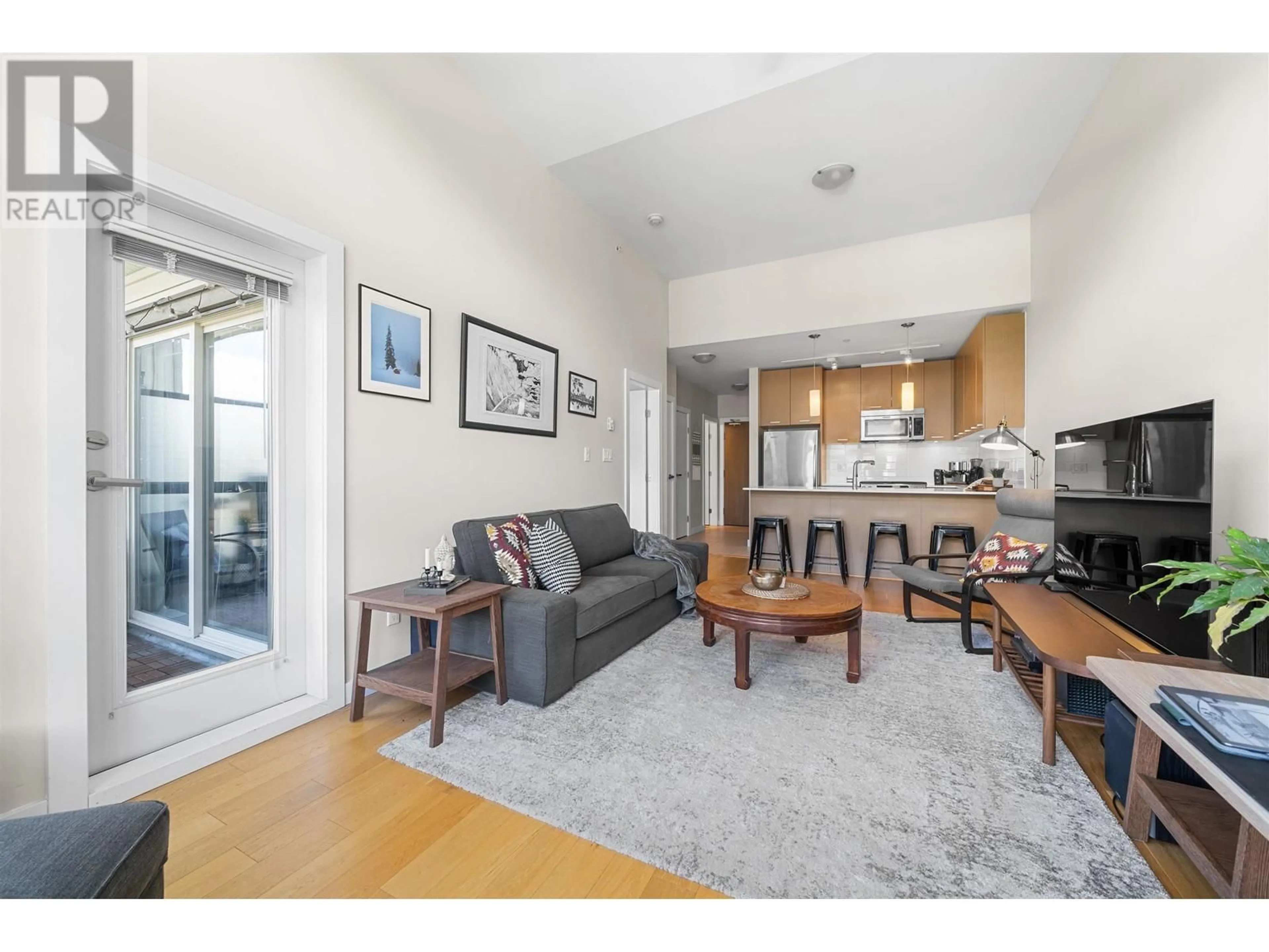 Living room with furniture, unknown for 402 - 1182 16TH STREET, North Vancouver British Columbia V7P0B3