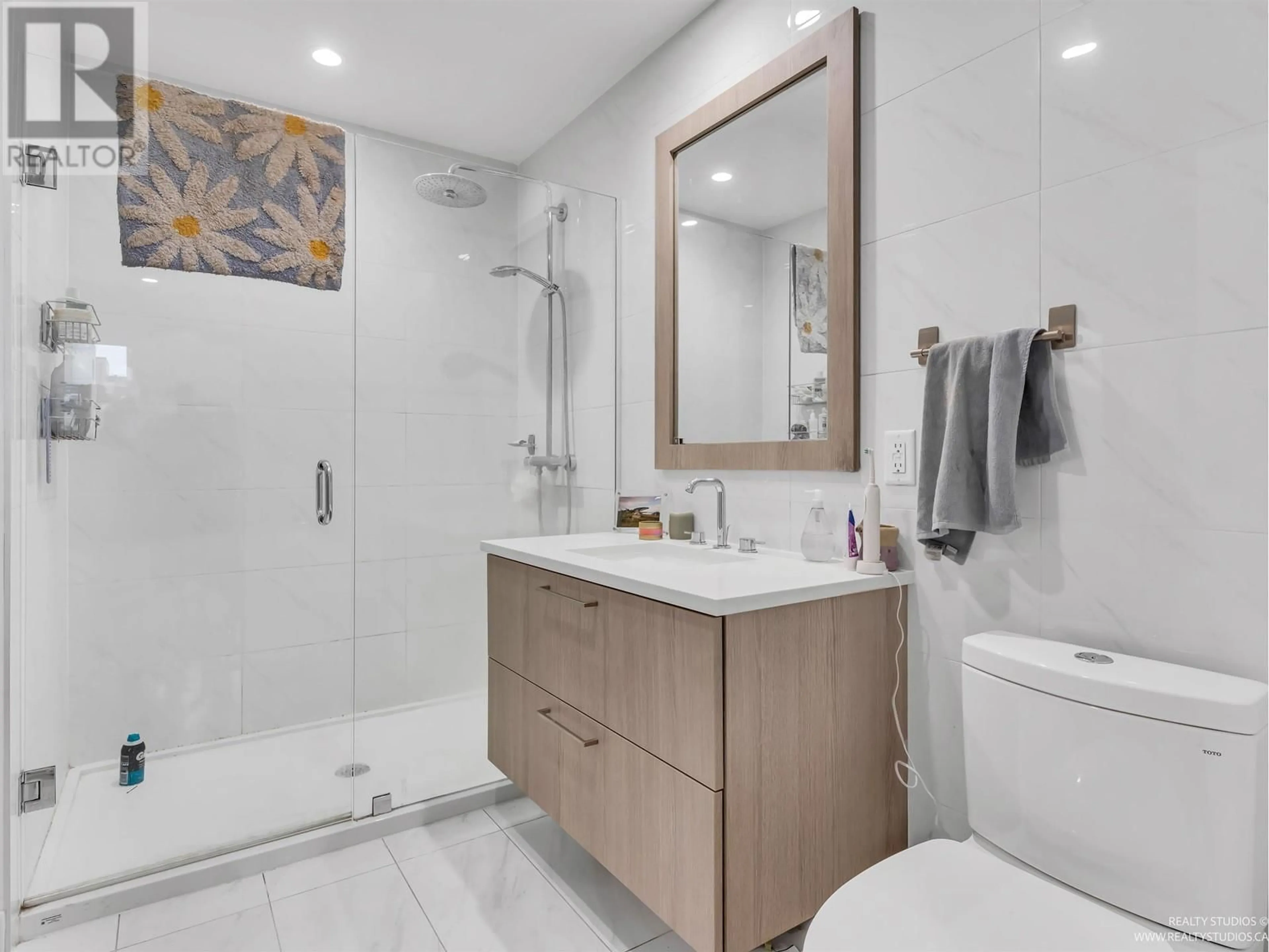 Standard bathroom, ceramic/tile floor for 214 - 707 EAST 3 STREET, North Vancouver British Columbia V7L1G8