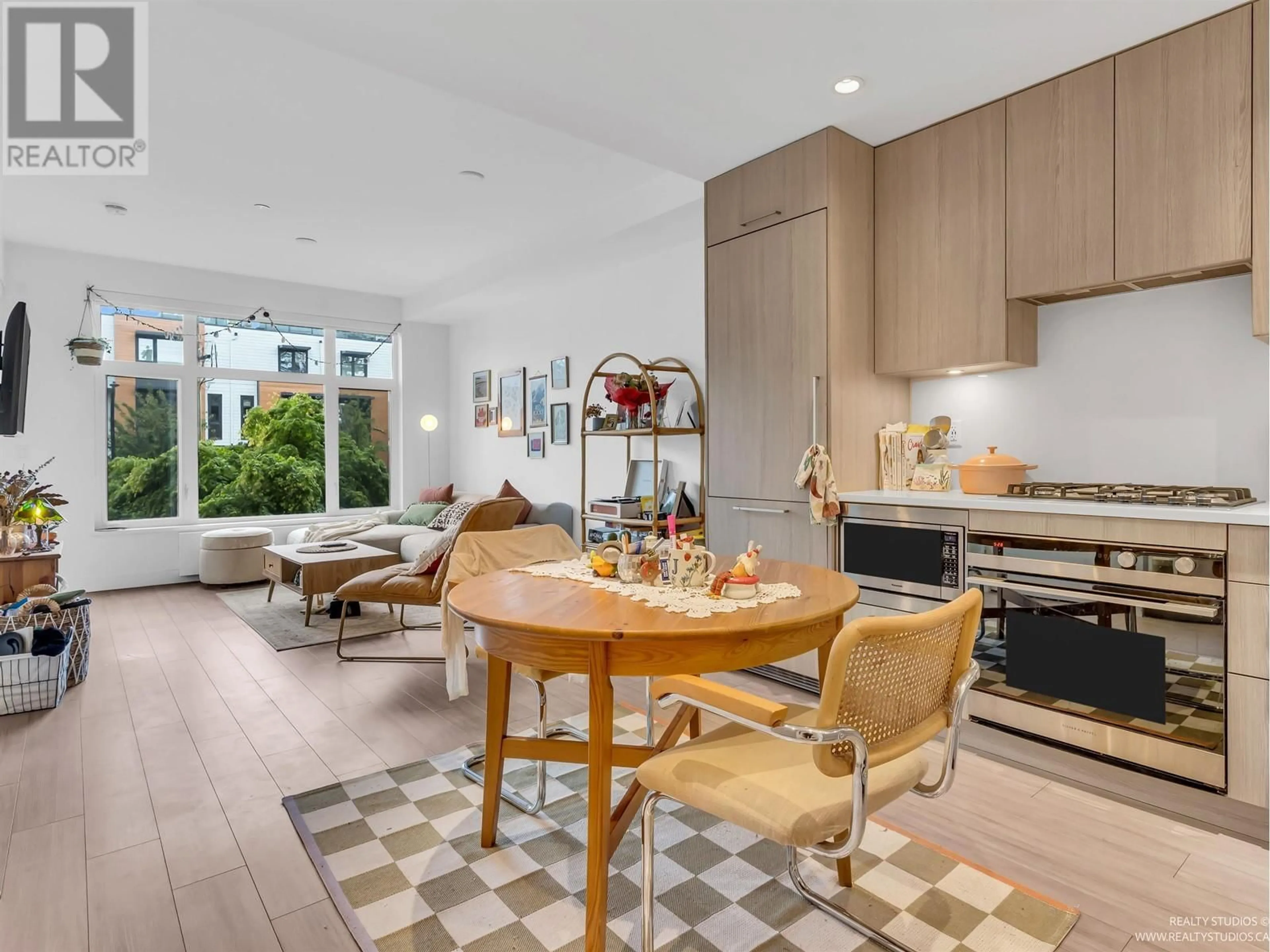 Open concept kitchen, unknown for 214 - 707 EAST 3 STREET, North Vancouver British Columbia V7L1G8