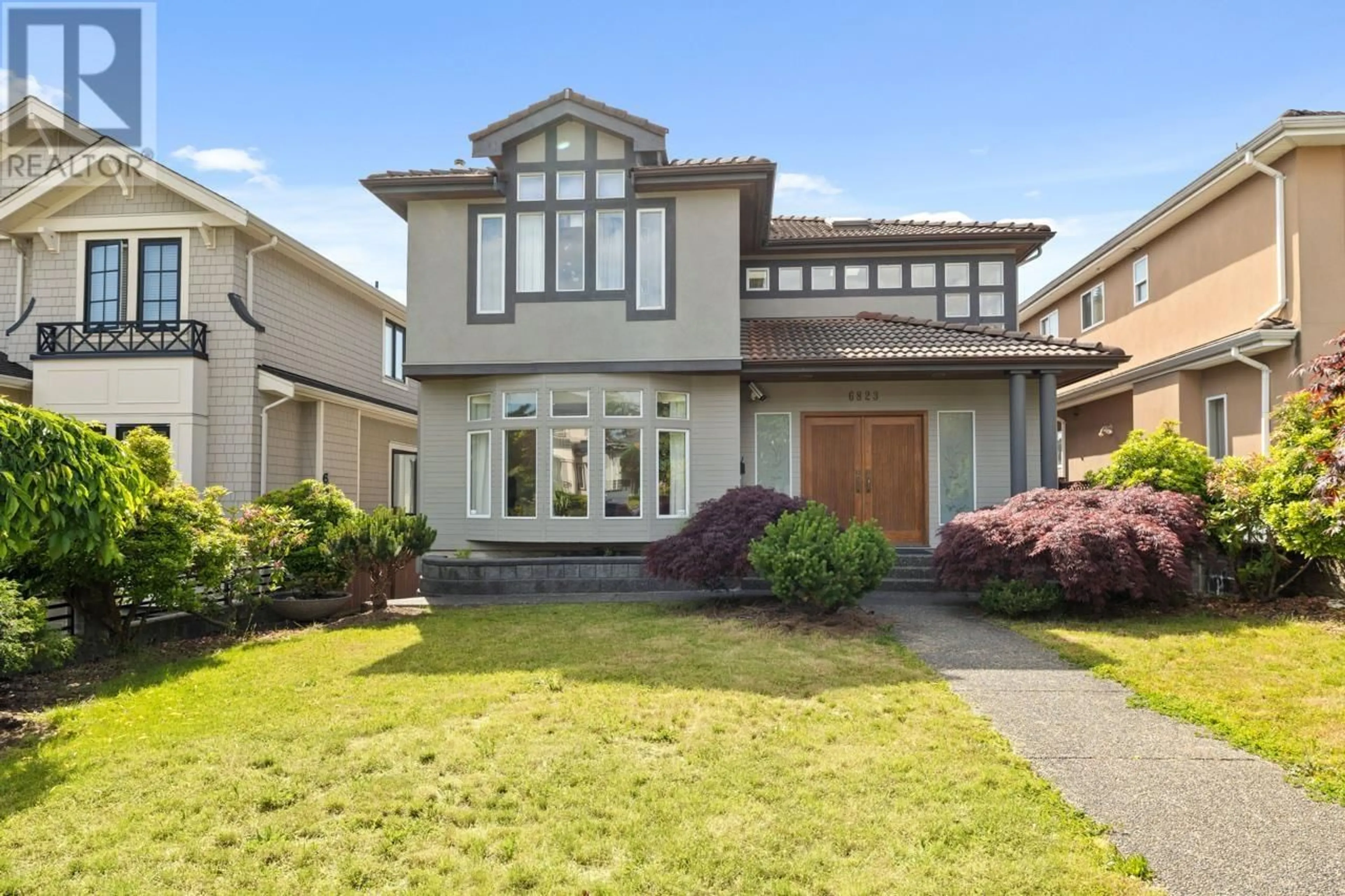Home with vinyl exterior material, street for 6823 KILLARNEY STREET, Vancouver British Columbia V5S2Y2