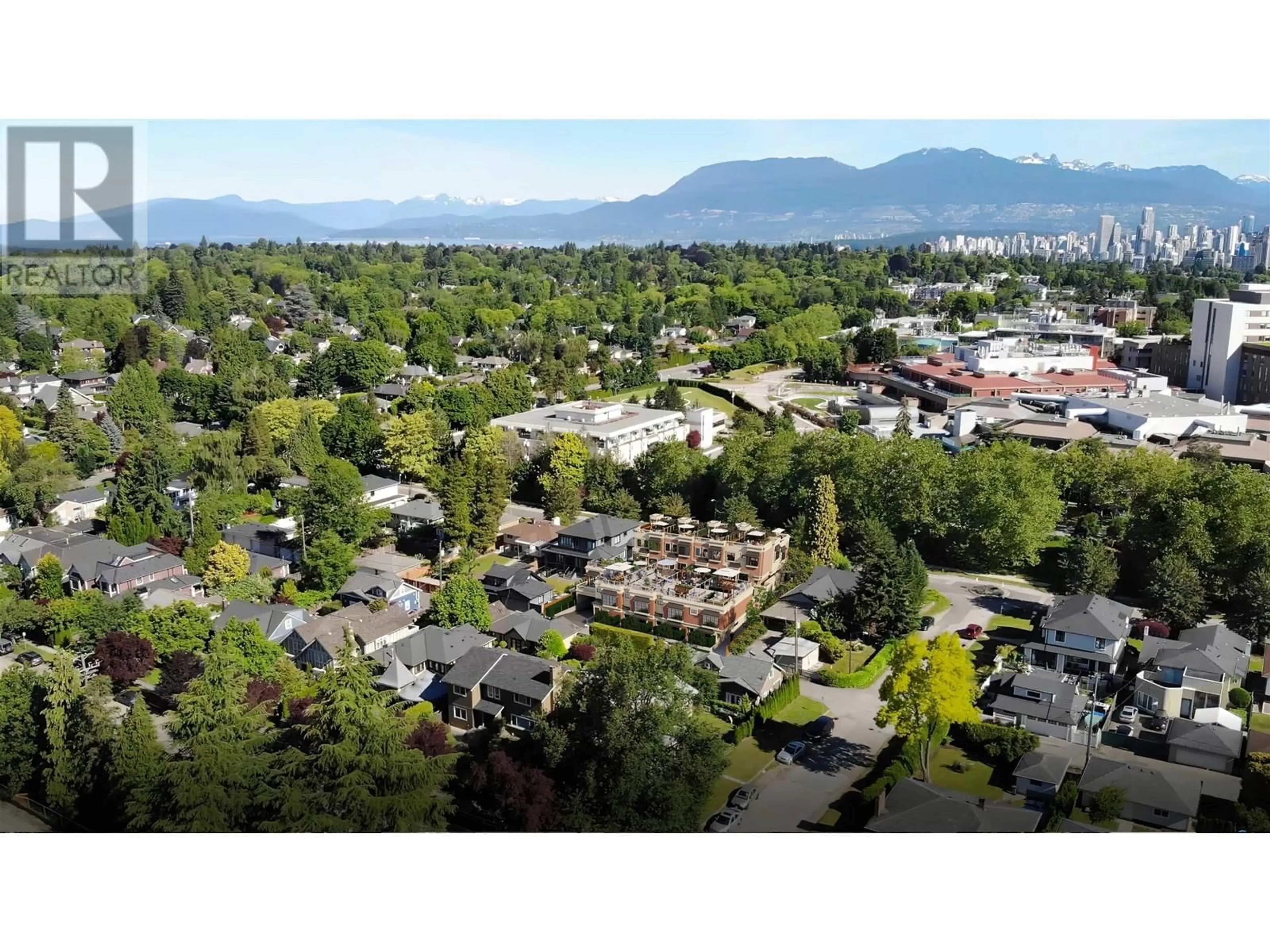 A pic from outside/outdoor area/front of a property/back of a property/a pic from drone, mountain view for 106 - 918 32ND AVENUE, Vancouver British Columbia V5Z2K2