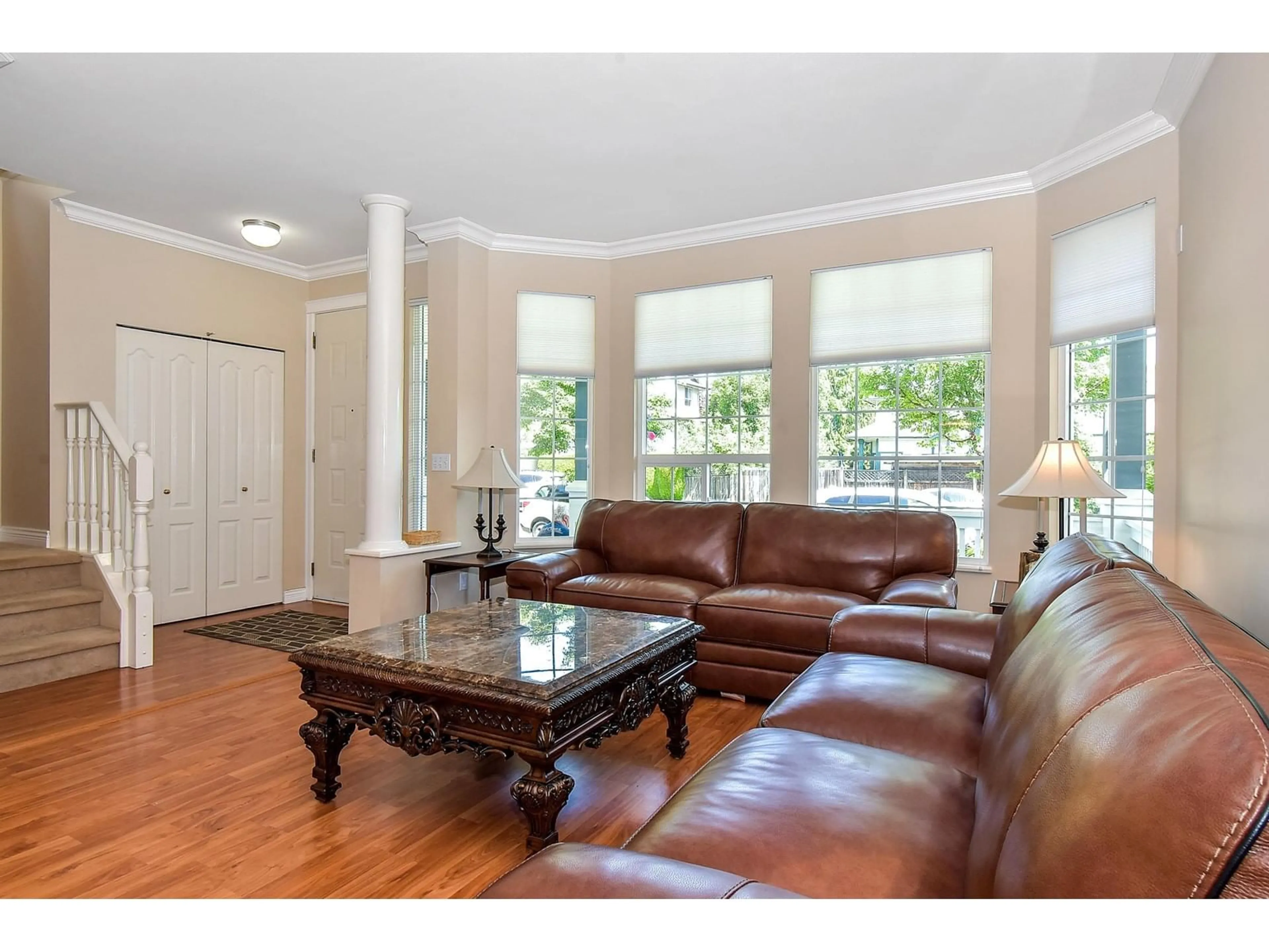 Living room with furniture, wood/laminate floor for 6459 186, Langley British Columbia V3S8S6