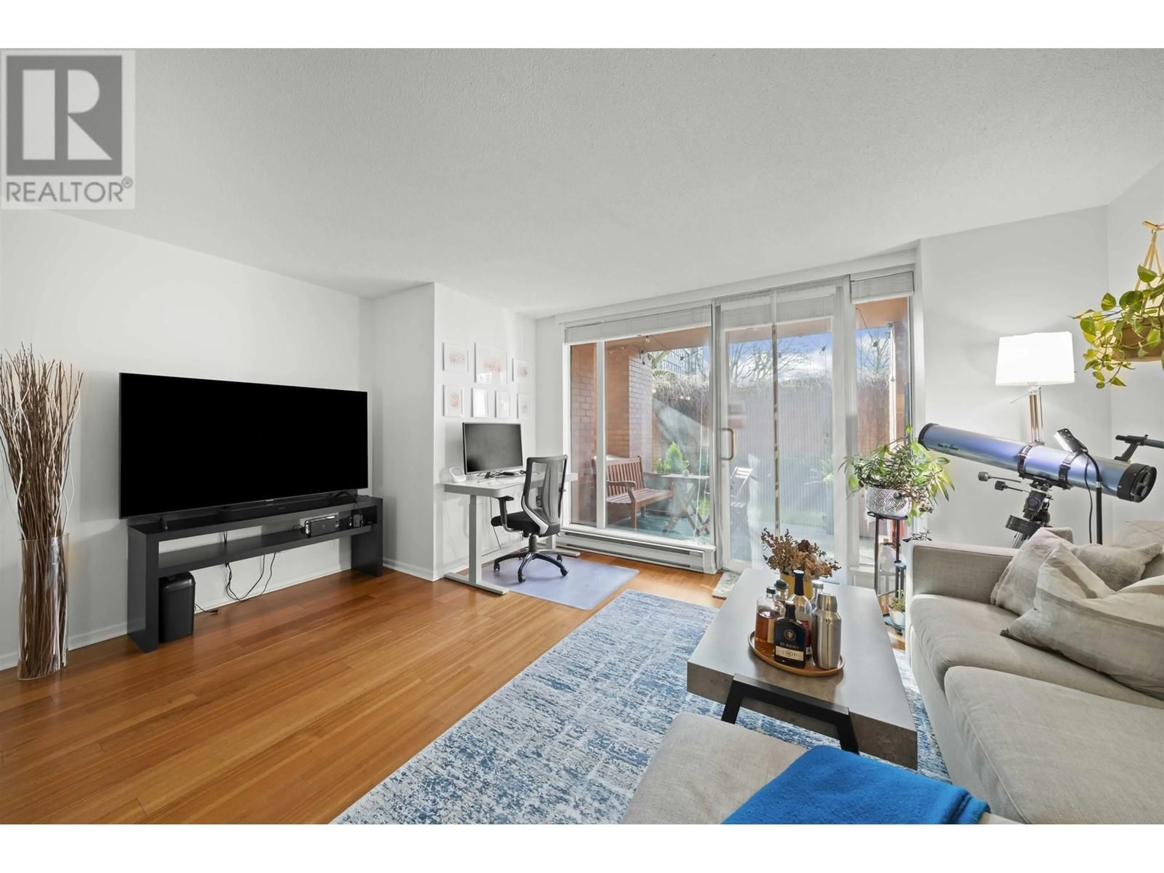 Living room with furniture, wood/laminate floor for 106 - 503 16TH AVENUE, Vancouver British Columbia V5Z4N3