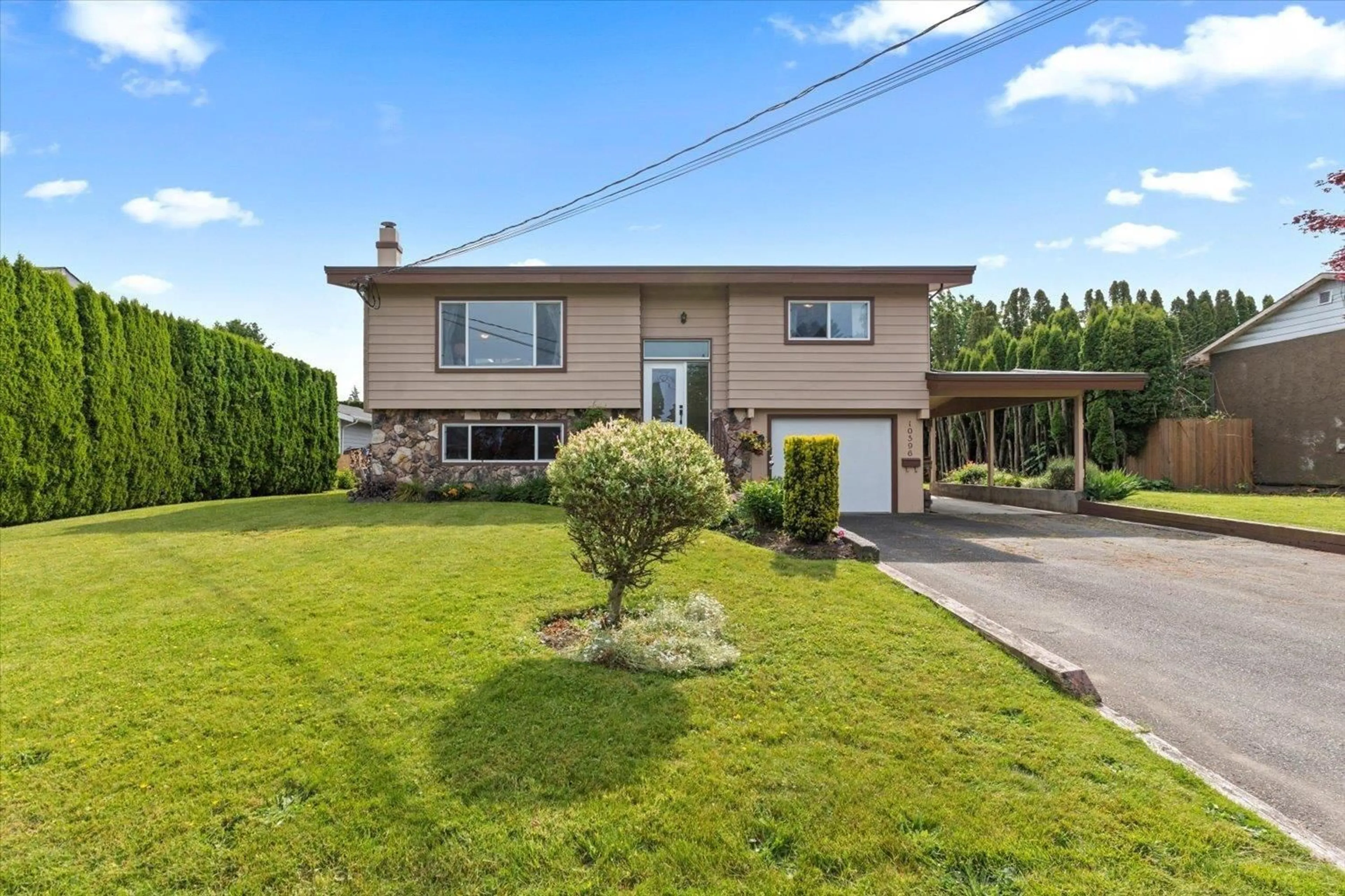 A pic from outside/outdoor area/front of a property/back of a property/a pic from drone, street for 10596 CONRAD STREET, Chilliwack British Columbia V2P6S3