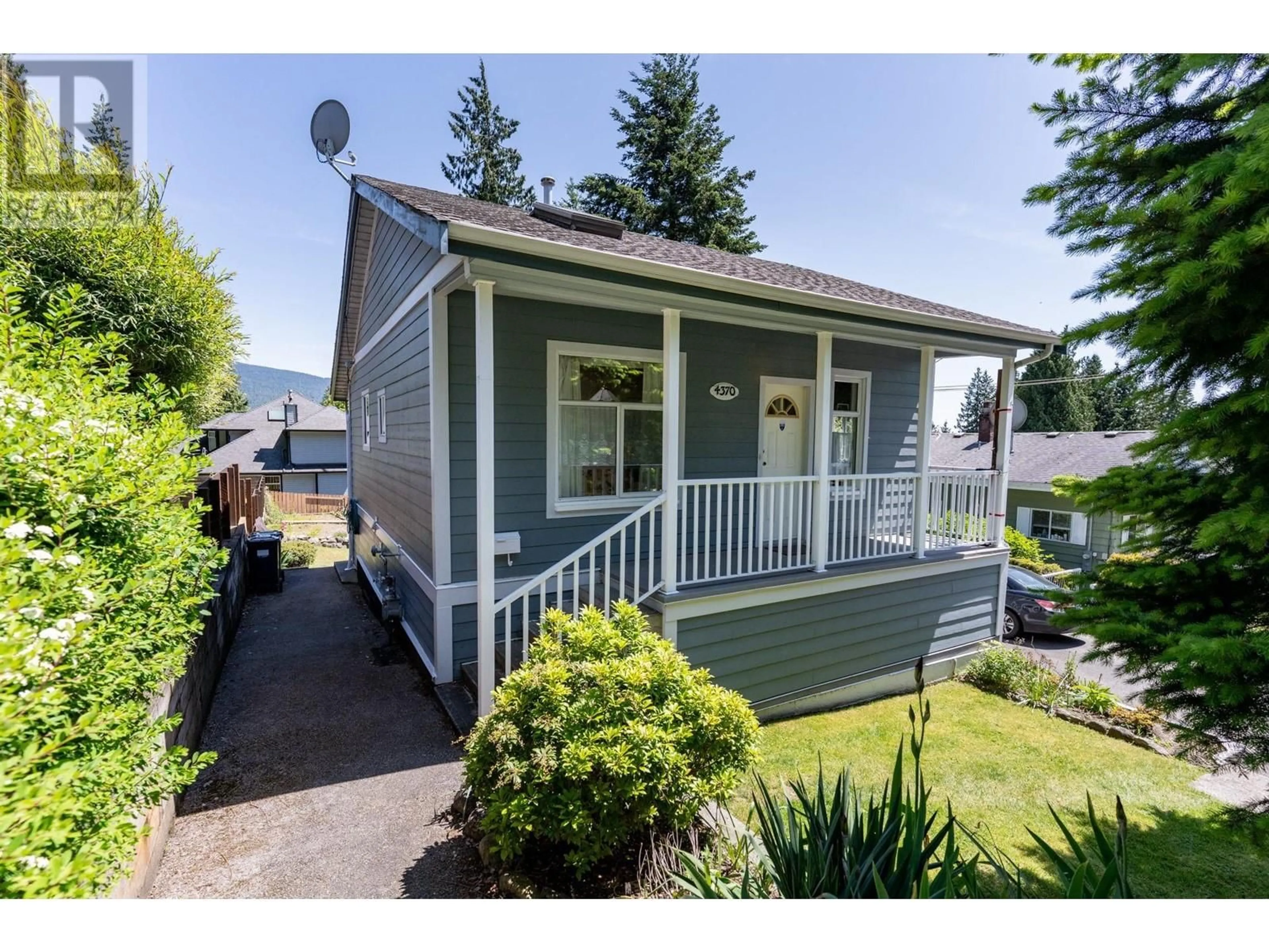 Home with vinyl exterior material, street for 4370 MOUNTAIN HIGHWAY, North Vancouver British Columbia V7K2K2