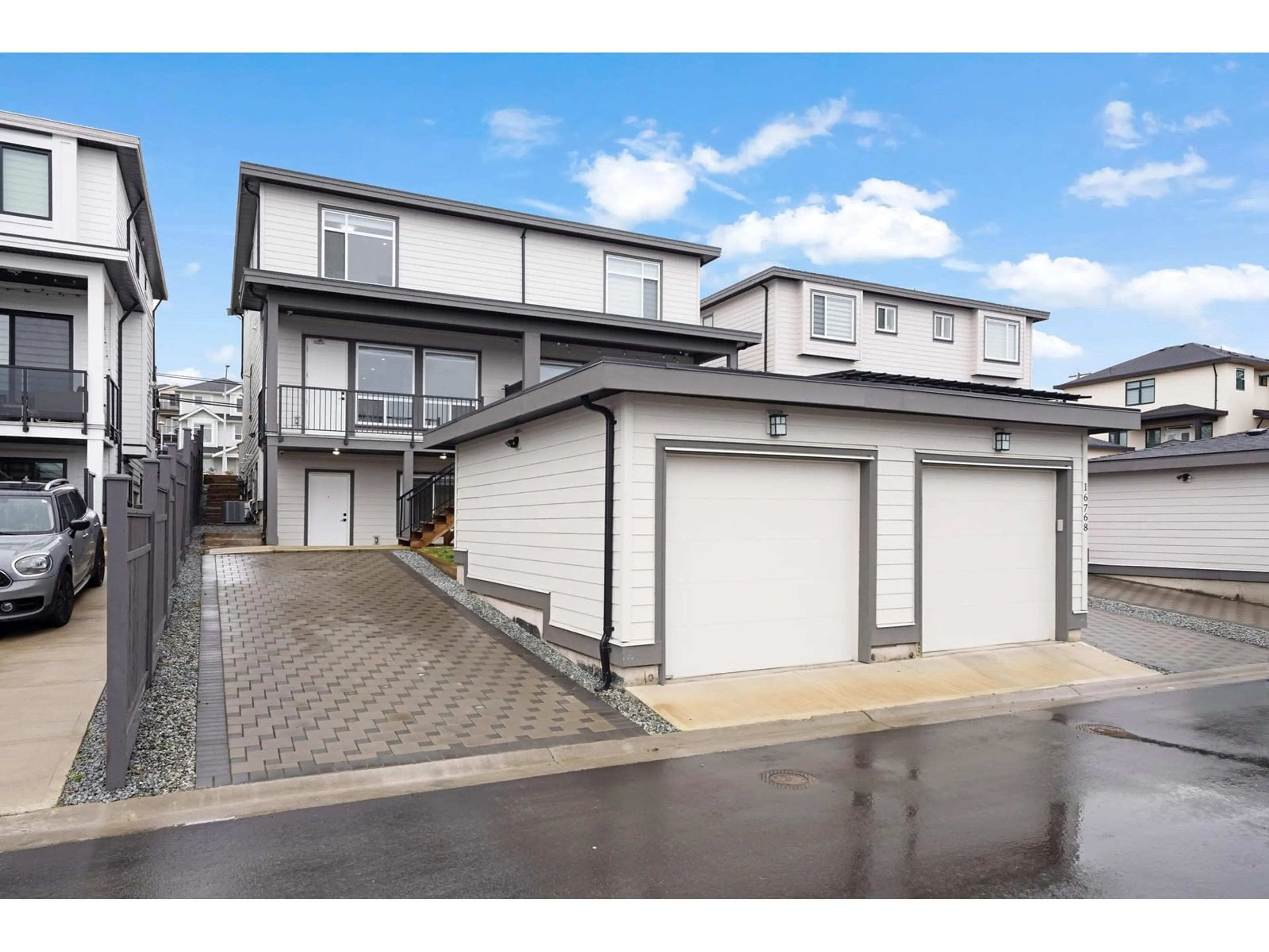 A pic from outside/outdoor area/front of a property/back of a property/a pic from drone, street for 16762 16, Surrey British Columbia V3S9X7