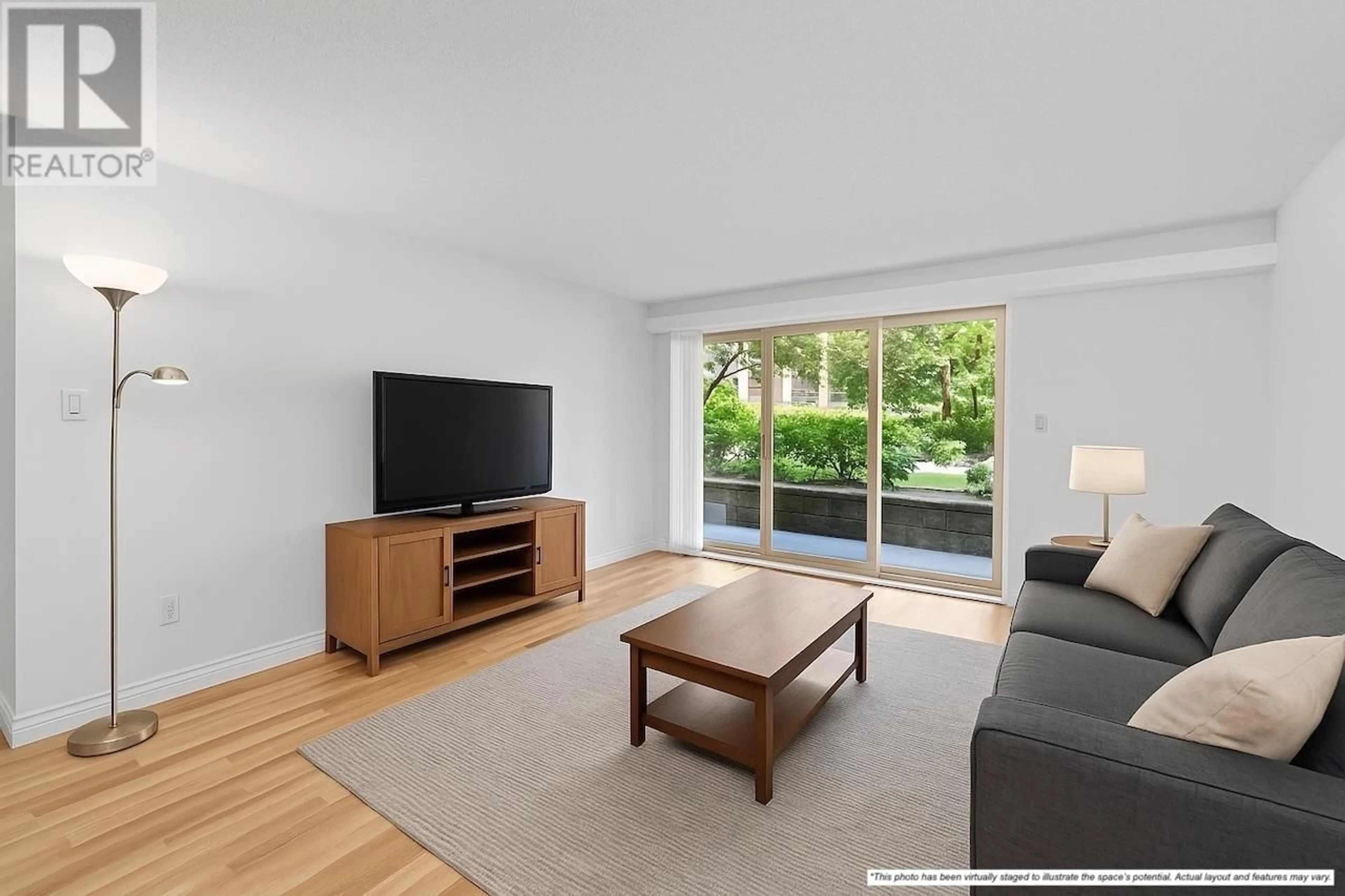 Living room with furniture, wood/laminate floor for 107 - 9847 MANCHESTER DRIVE, Burnaby British Columbia V5A2C3