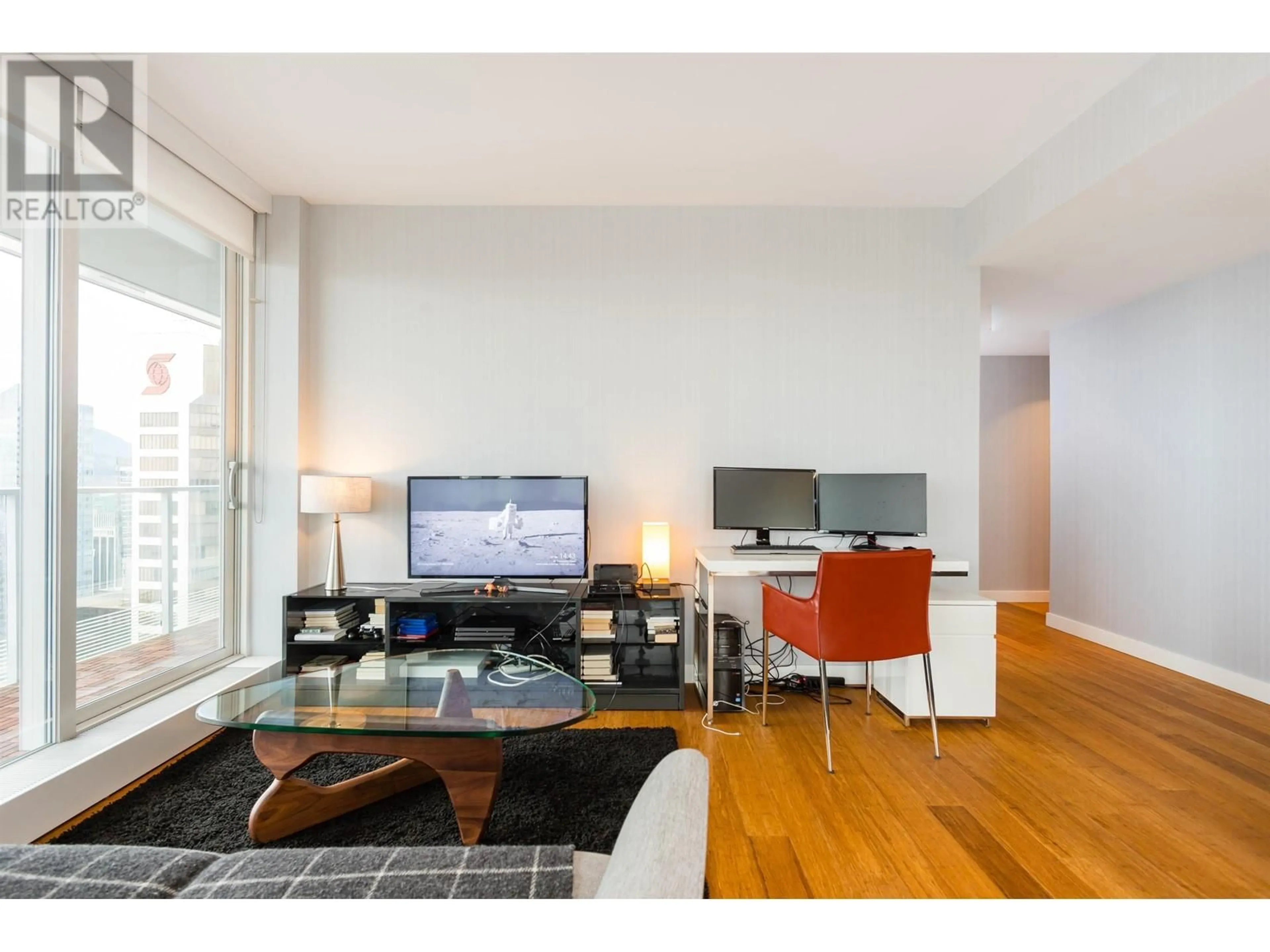 Living room with furniture, wood/laminate floor for 4802 - 777 RICHARDS STREET, Vancouver British Columbia V6B0M6