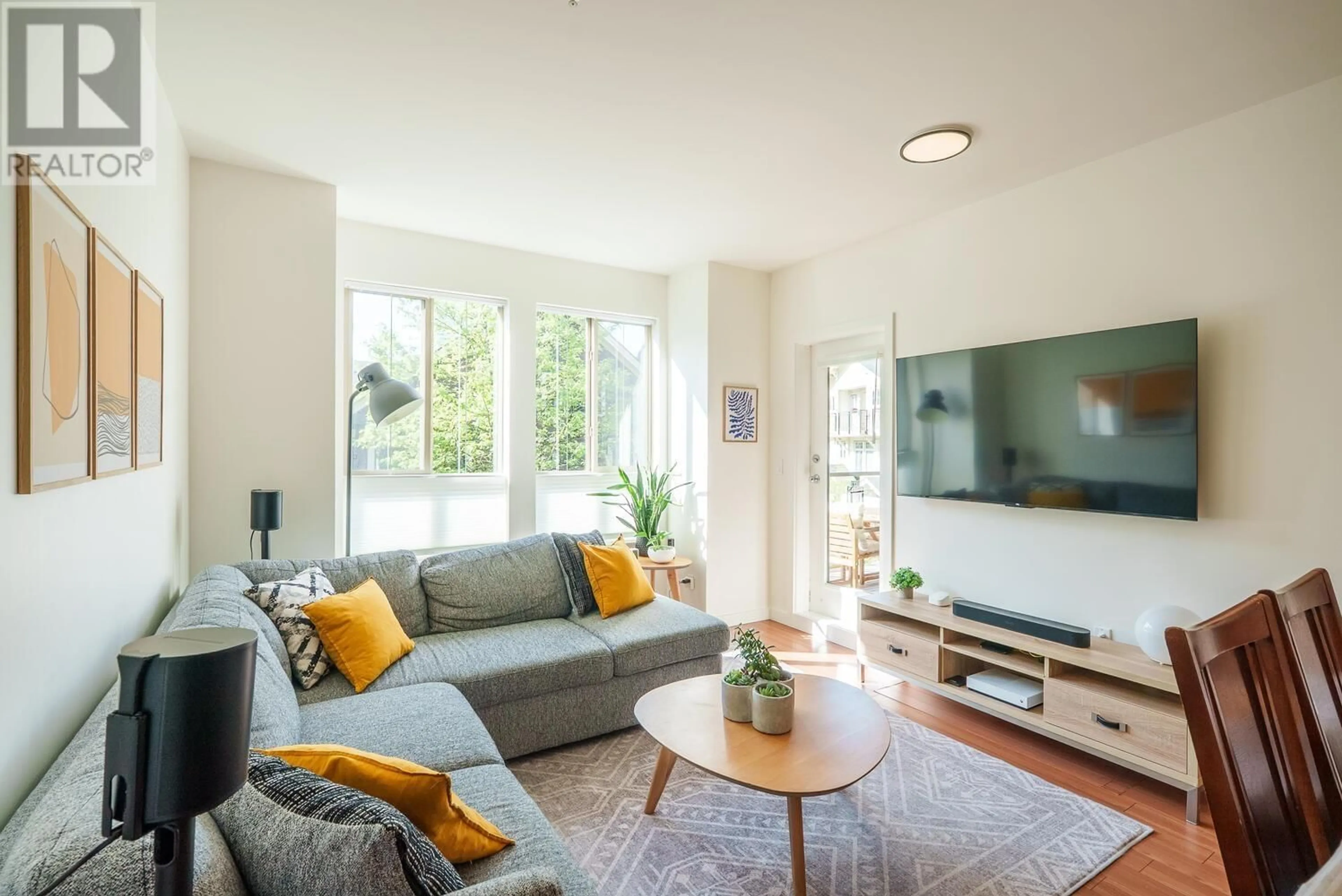 Living room with furniture, unknown for 314 - 225 FRANCIS WAY, New Westminster British Columbia V3L0G1