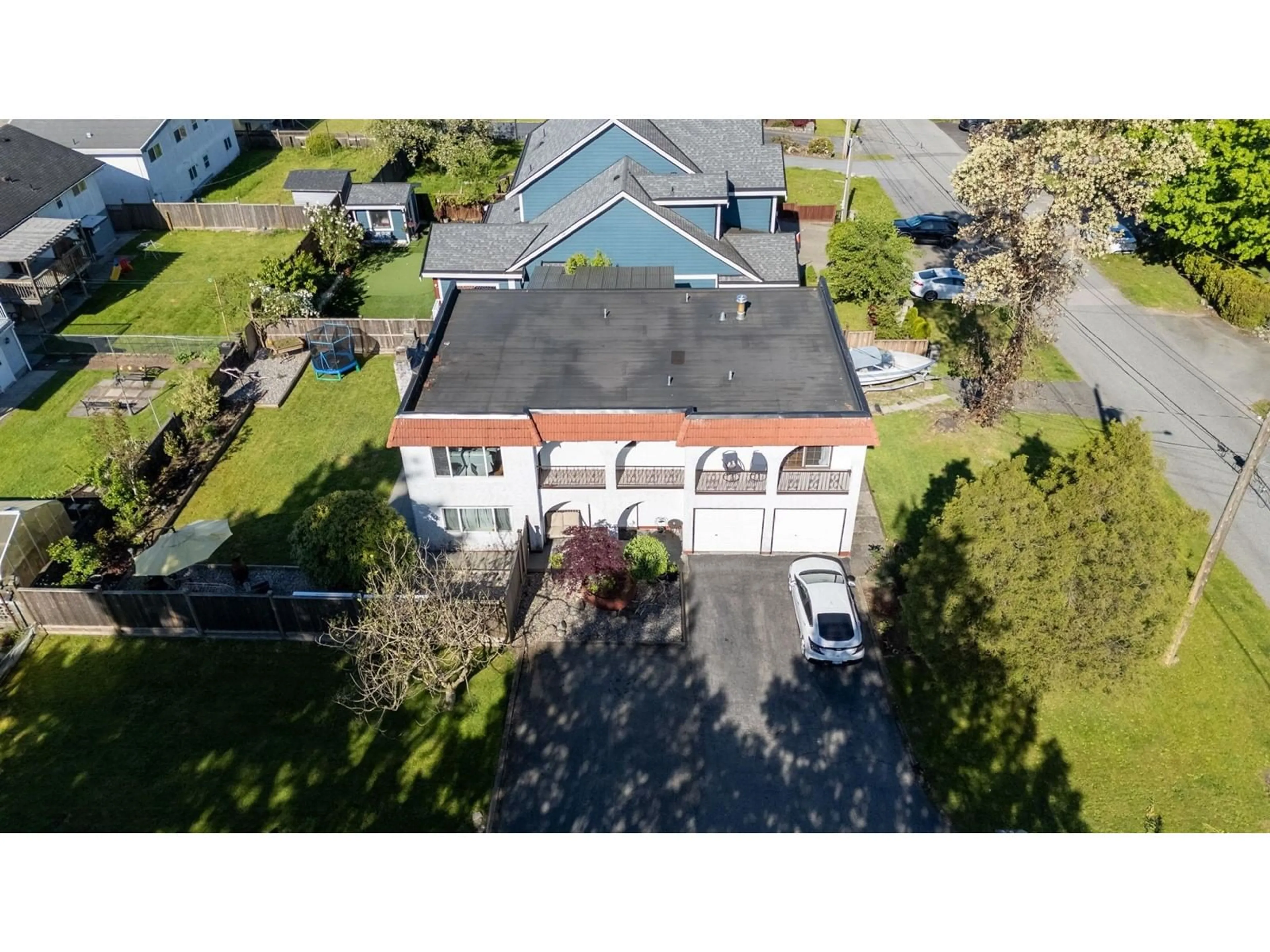 A pic from outside/outdoor area/front of a property/back of a property/a pic from drone, building for 8645 114A, Delta British Columbia V4C5L9