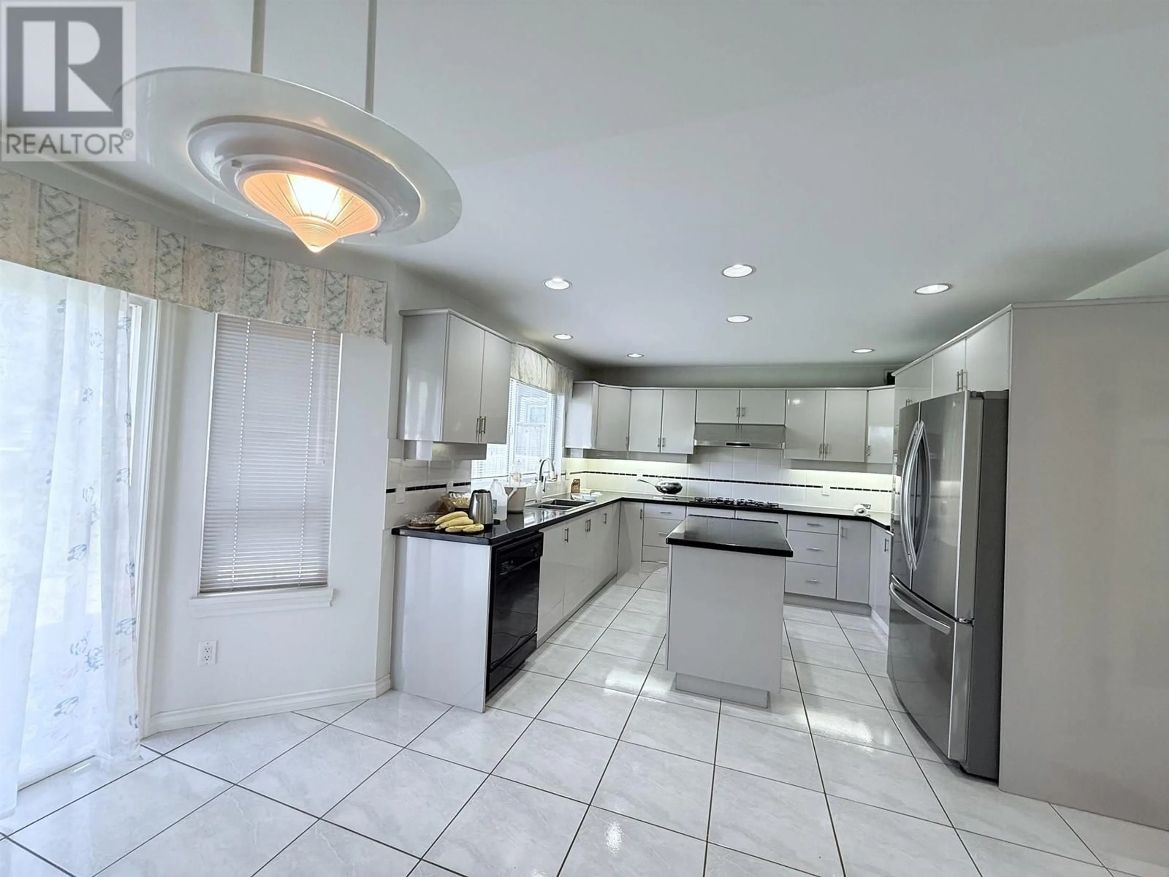 Open concept kitchen, ceramic/tile floor for 12631 CAMERON DRIVE, Richmond British Columbia V6V2T6