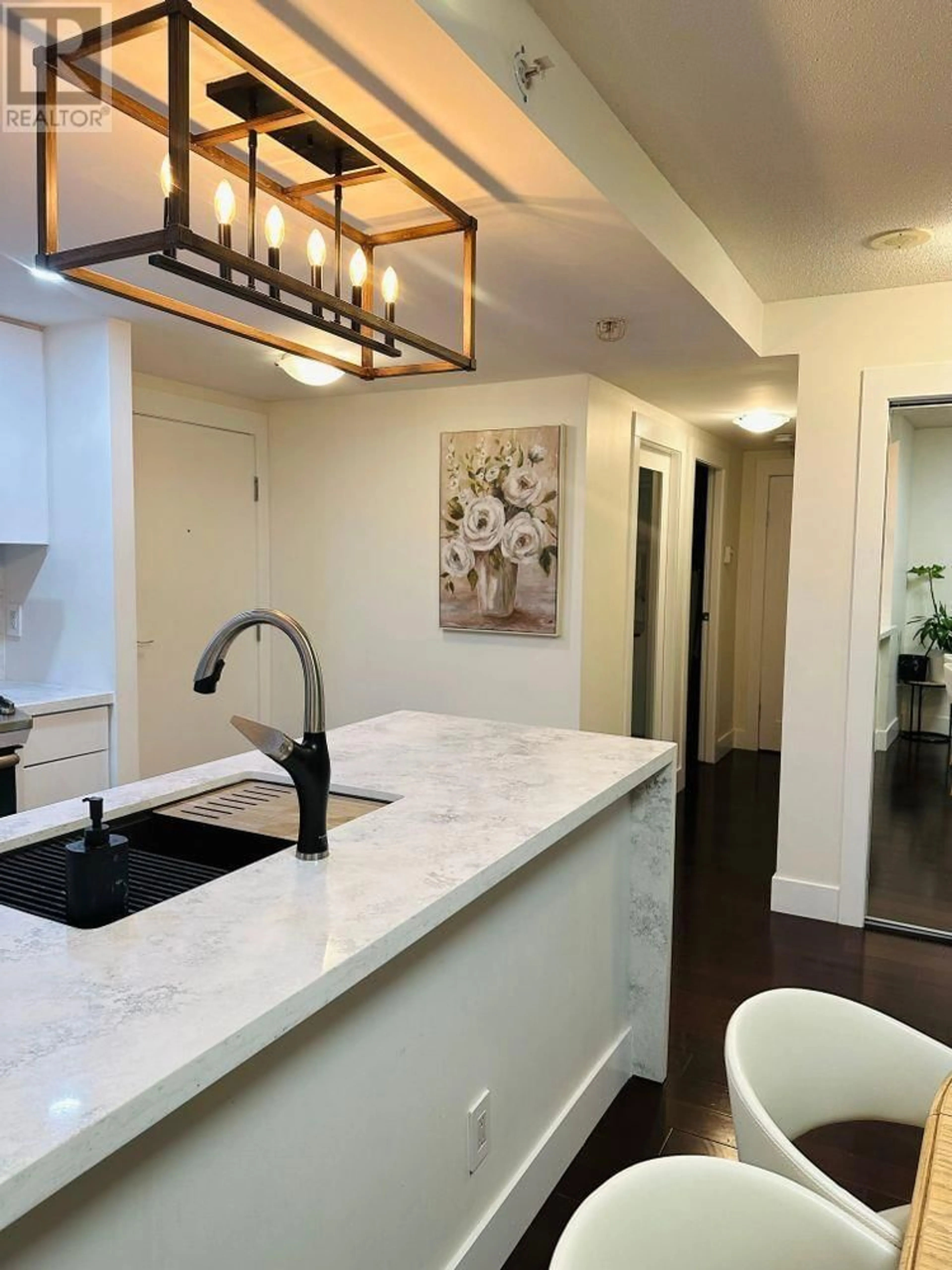Open concept kitchen, ceramic/tile floor for 202 - 1033 MARINASIDE CRESCENT, Vancouver British Columbia V6Z3A3