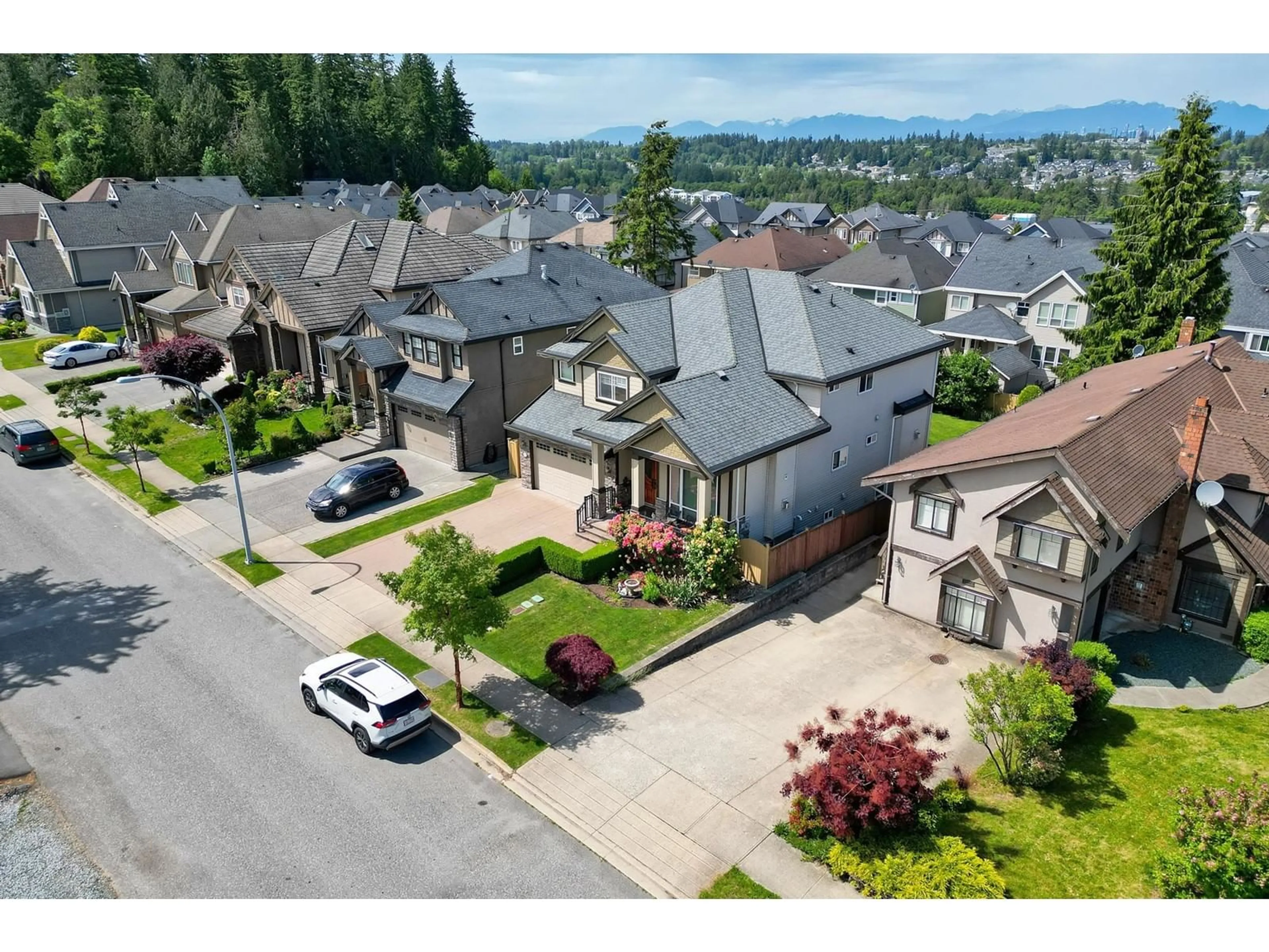 A pic from outside/outdoor area/front of a property/back of a property/a pic from drone, mountain view for 14759 60A, Surrey British Columbia V3S3W5