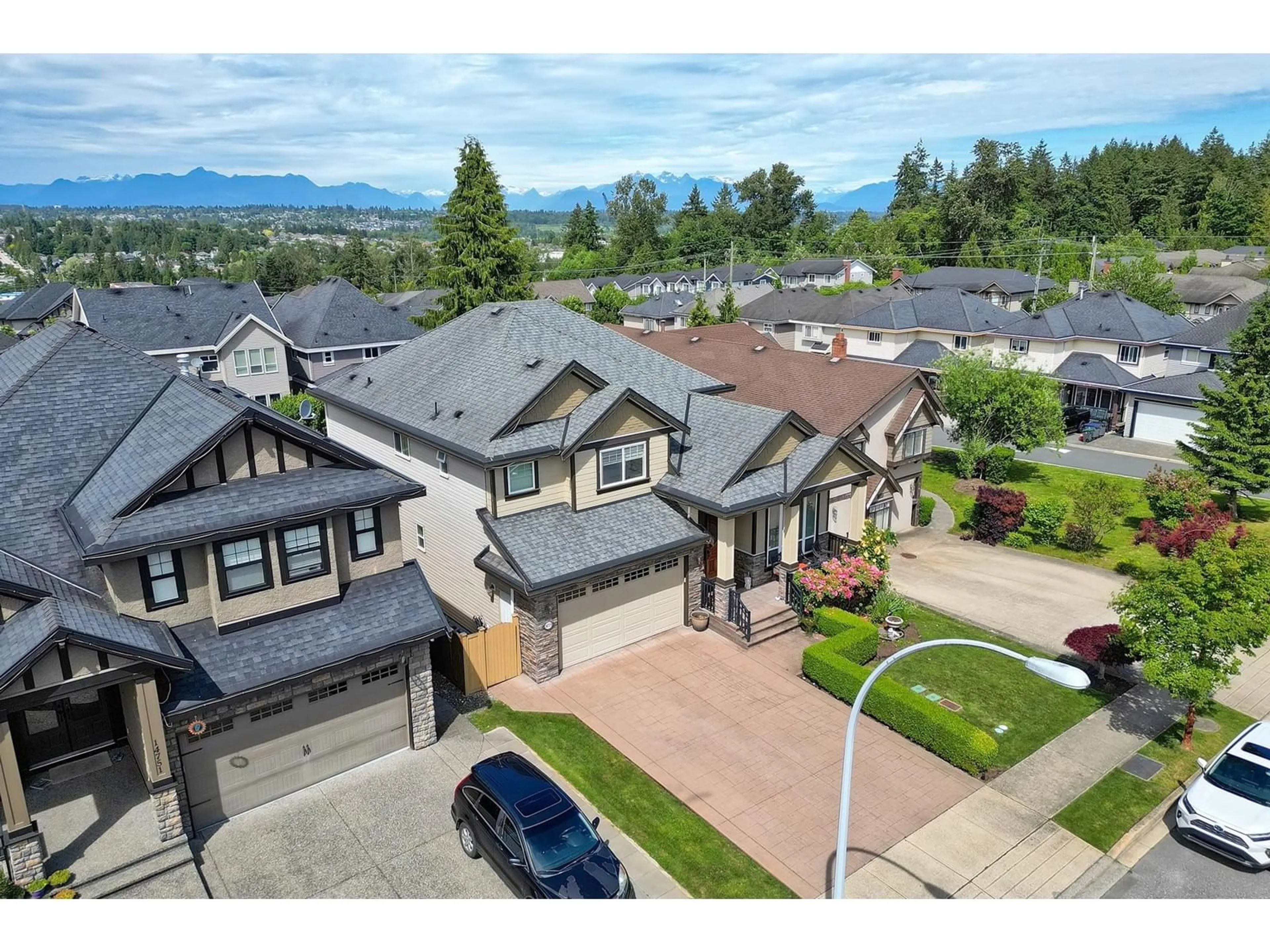 A pic from outside/outdoor area/front of a property/back of a property/a pic from drone, mountain view for 14759 60A, Surrey British Columbia V3S3W5