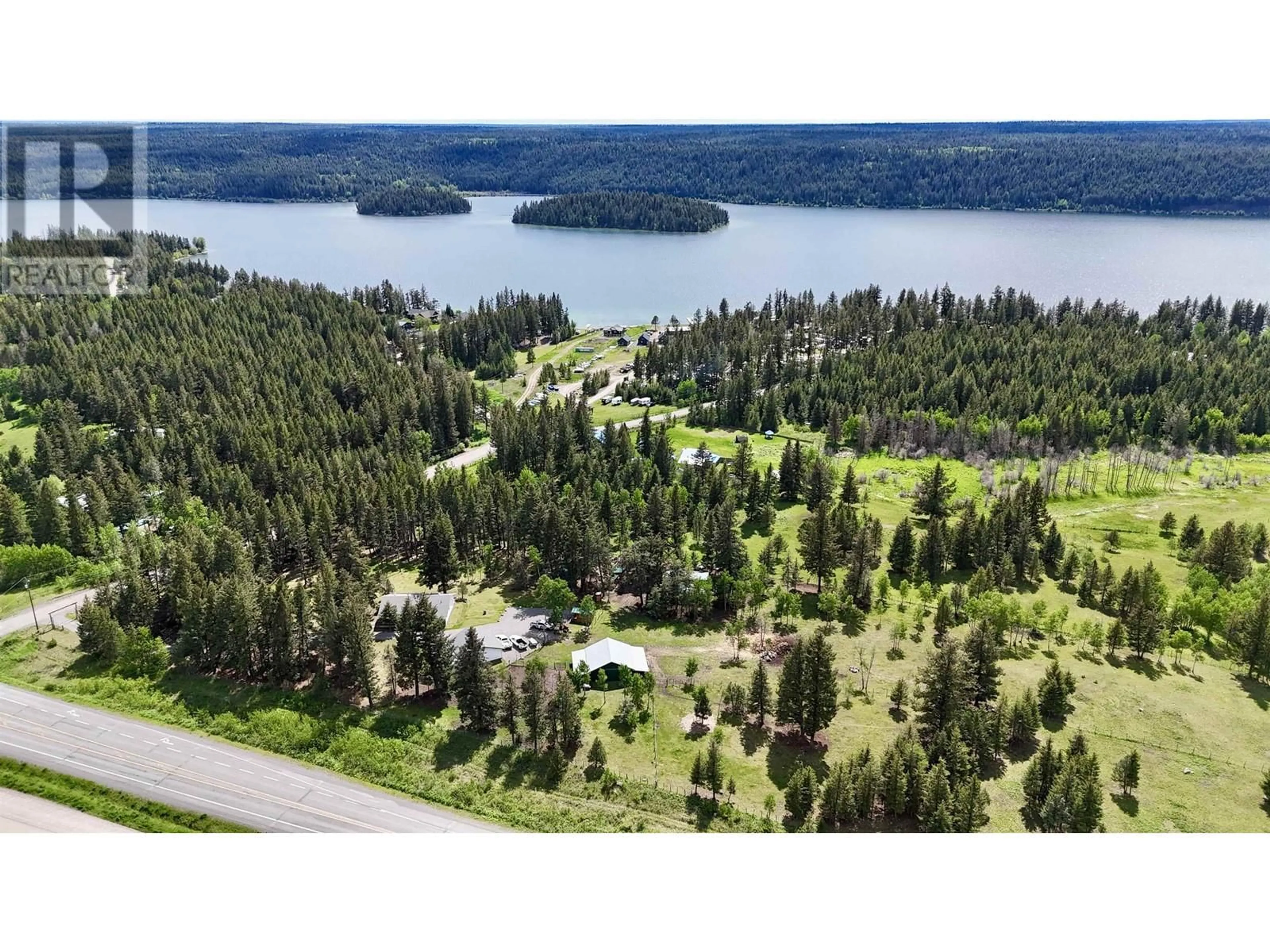 A pic from outside/outdoor area/front of a property/back of a property/a pic from drone, water/lake/river/ocean view for 4457 FIRCREST ROAD, Lac La Hache British Columbia V0K1T1