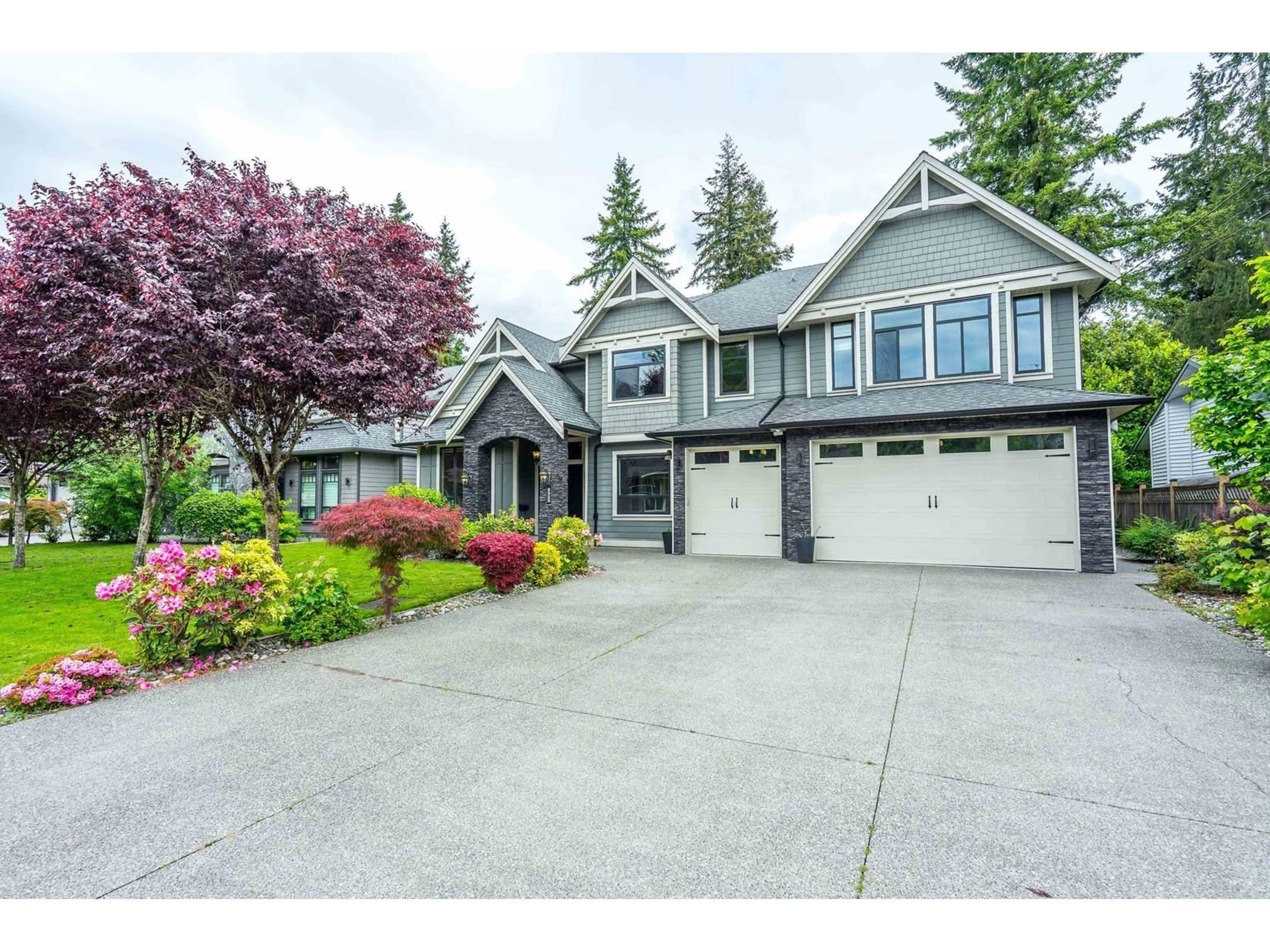 Home with vinyl exterior material, street for 3922 205A, Langley British Columbia V3A2A3