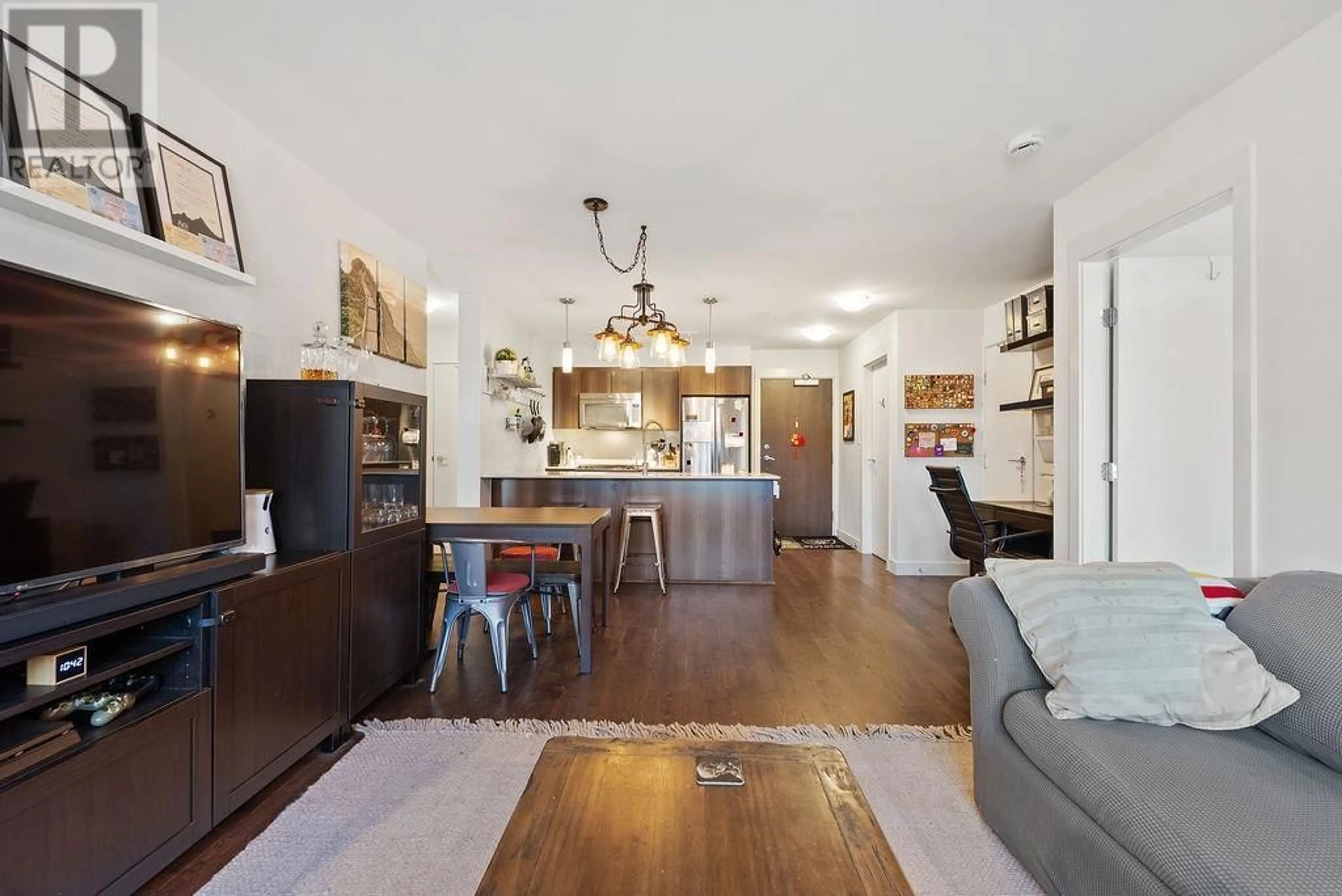 Open concept kitchen, wood/laminate floor for 213 - 7058 14TH AVENUE, Burnaby British Columbia V3N0E6
