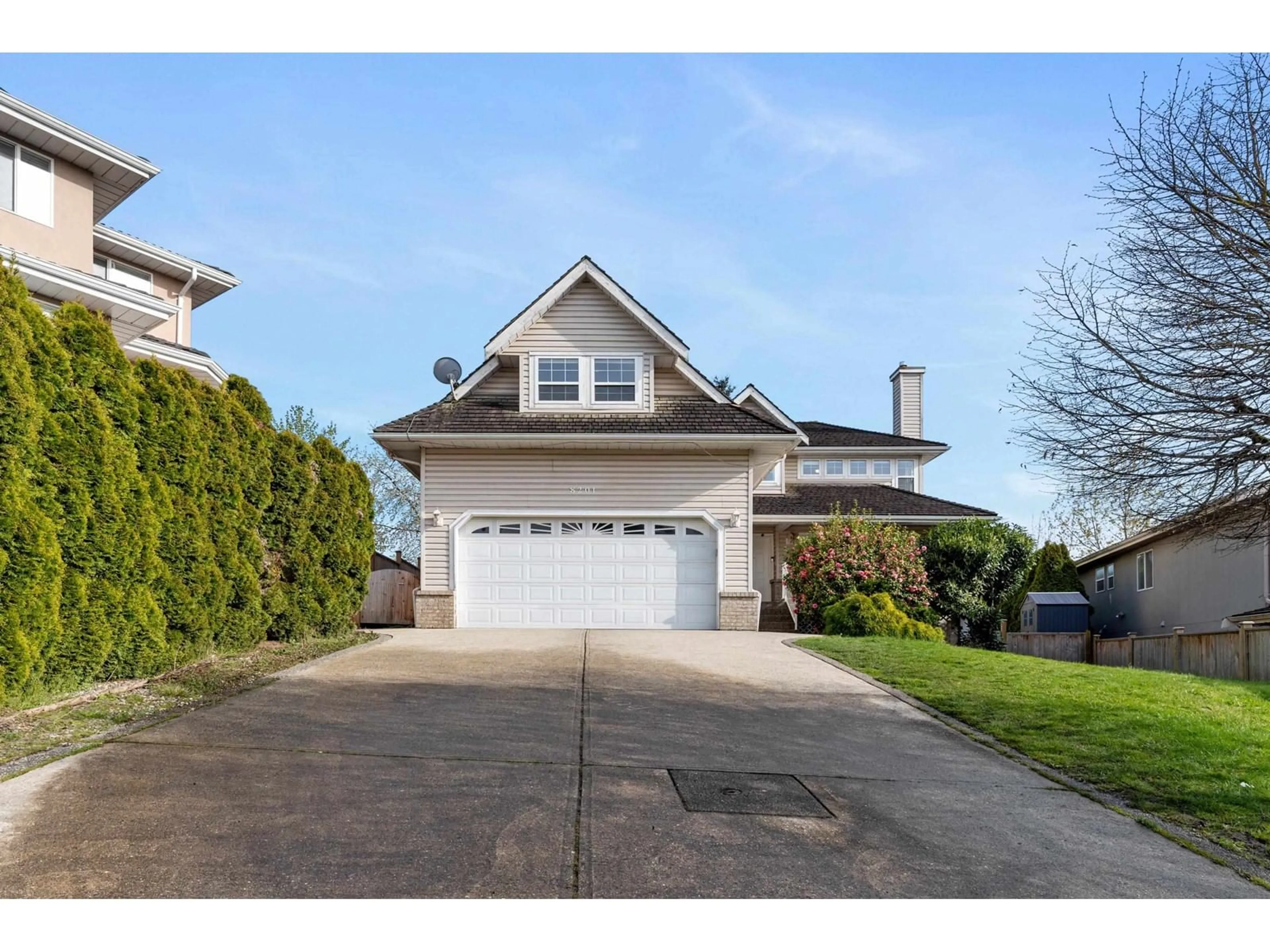 Home with vinyl exterior material, street for 8201 NECHAKO, Delta British Columbia V4C3X2